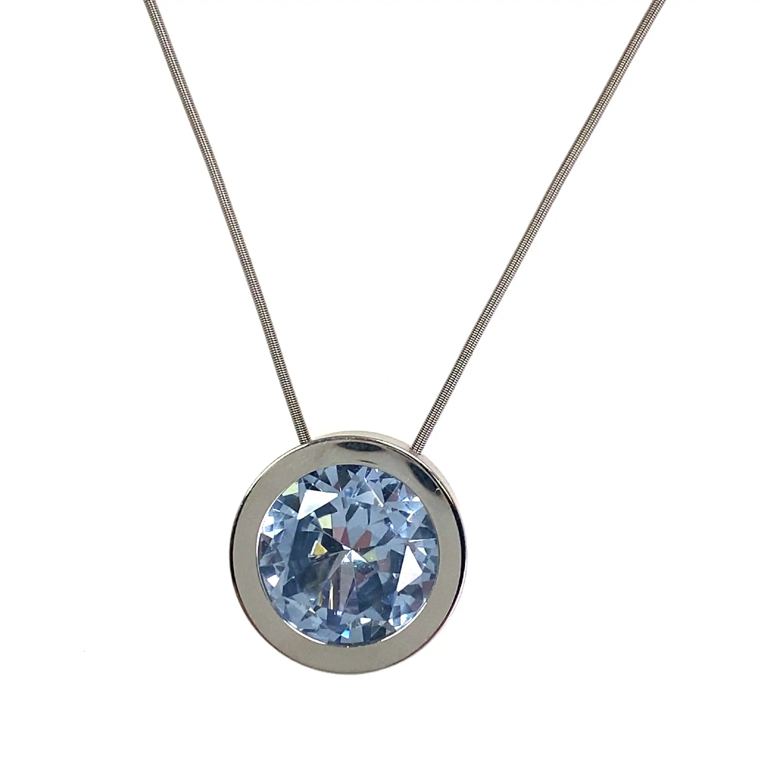 Kette mit Anhänger Niessing Stahl mit Aquamarin Spinell Kette mit Anhänger Niessing Stahl mit Aquamarin Spinell