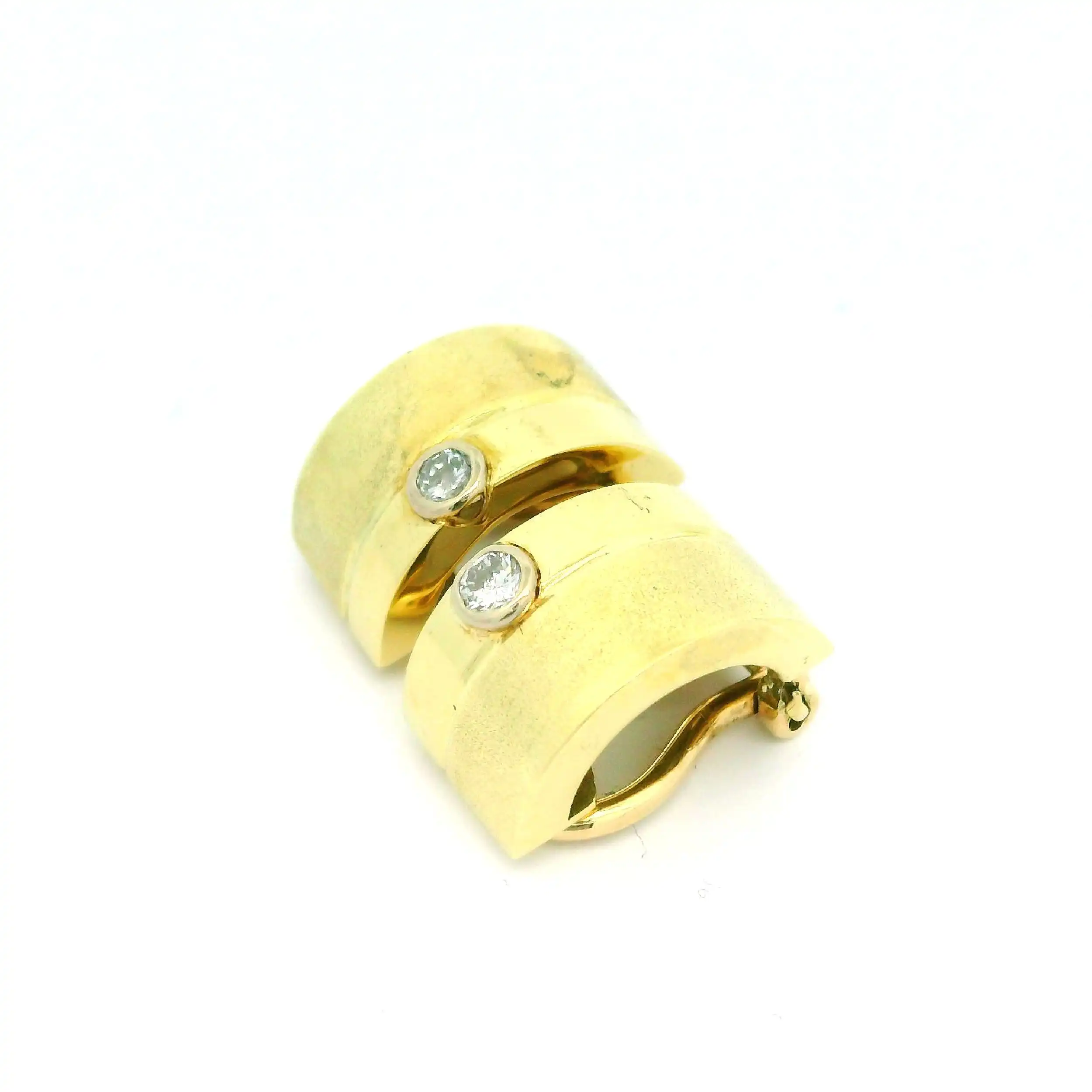 Ohrclips Gelbgold mit Brillanten Ohrclips Gelbgold mit Brillanten