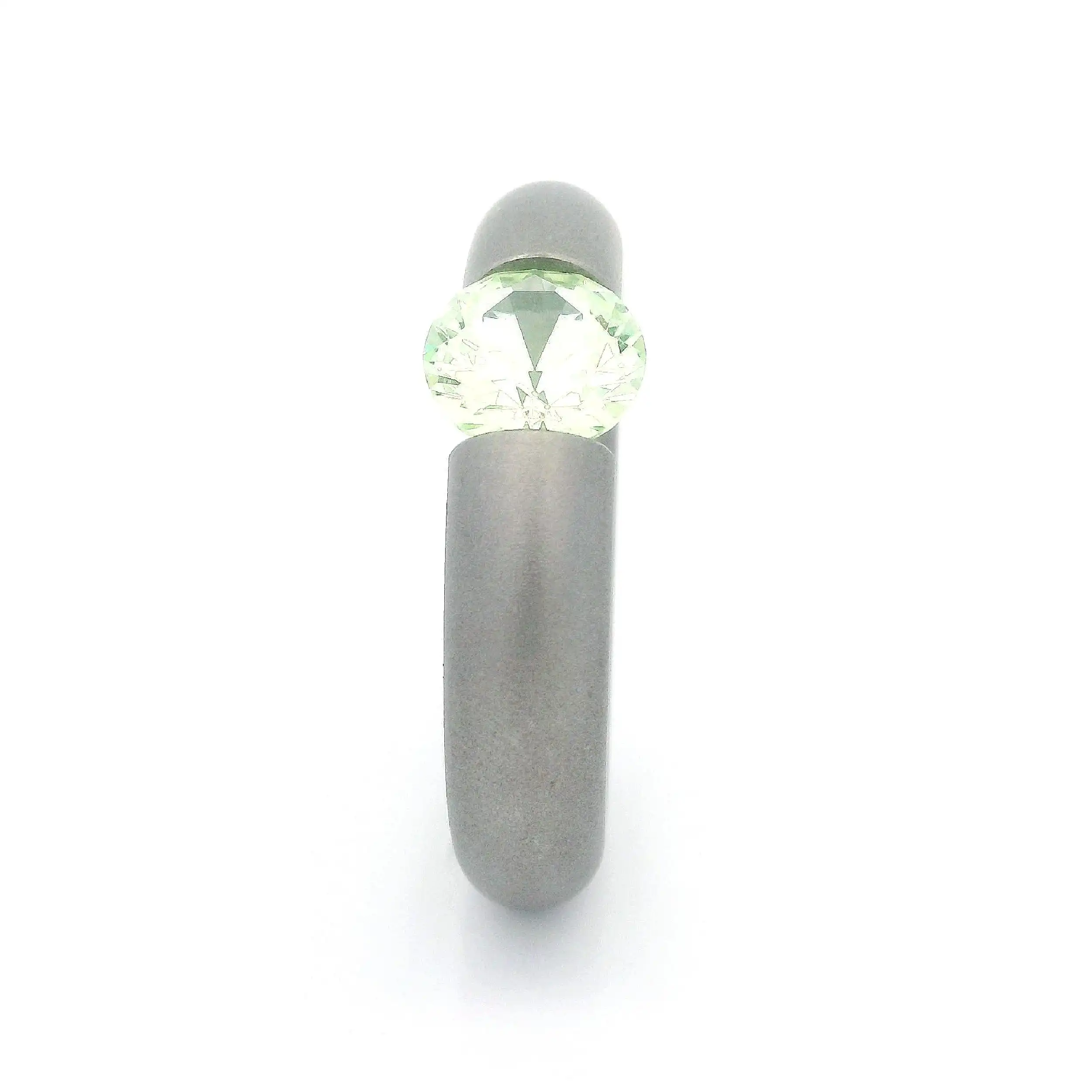 Spannring Edelstahl Niessing mit synthetischem Chrysolith Spannring Edelstahl Niessing mit synthetischem Chrysolith