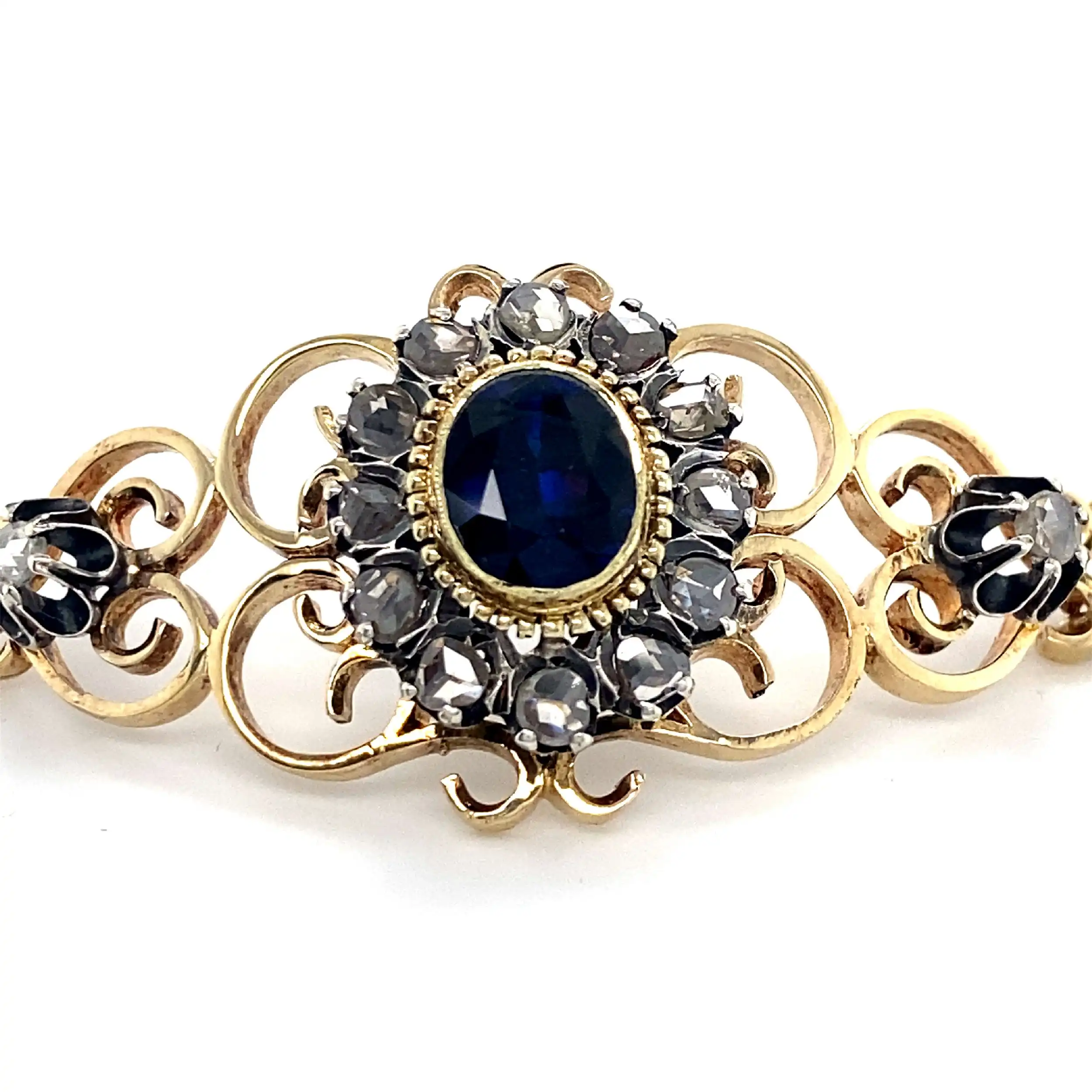 Armband Gelbgold mit Rosen und Saphirdoublette in Silberfasung Armband Gelbgold mit Rosen und Saphirdoublette in Silberfasung