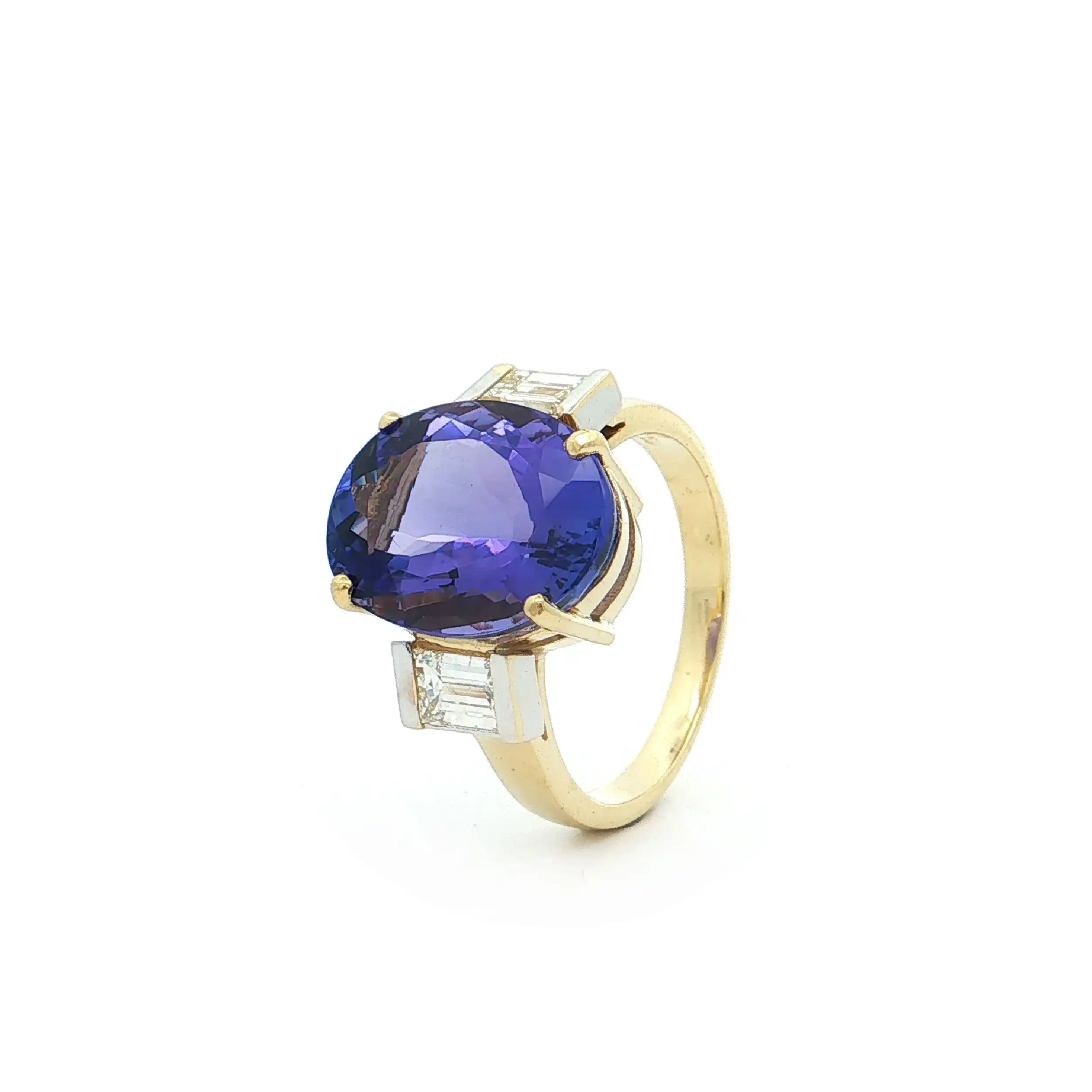 Ring Bicolor mit Tansanit und Baguette Diamanten mit Expertise von DSEF Ring Bicolor mit Tansanit und Baguette Diamanten mit Expertise von DSEF
