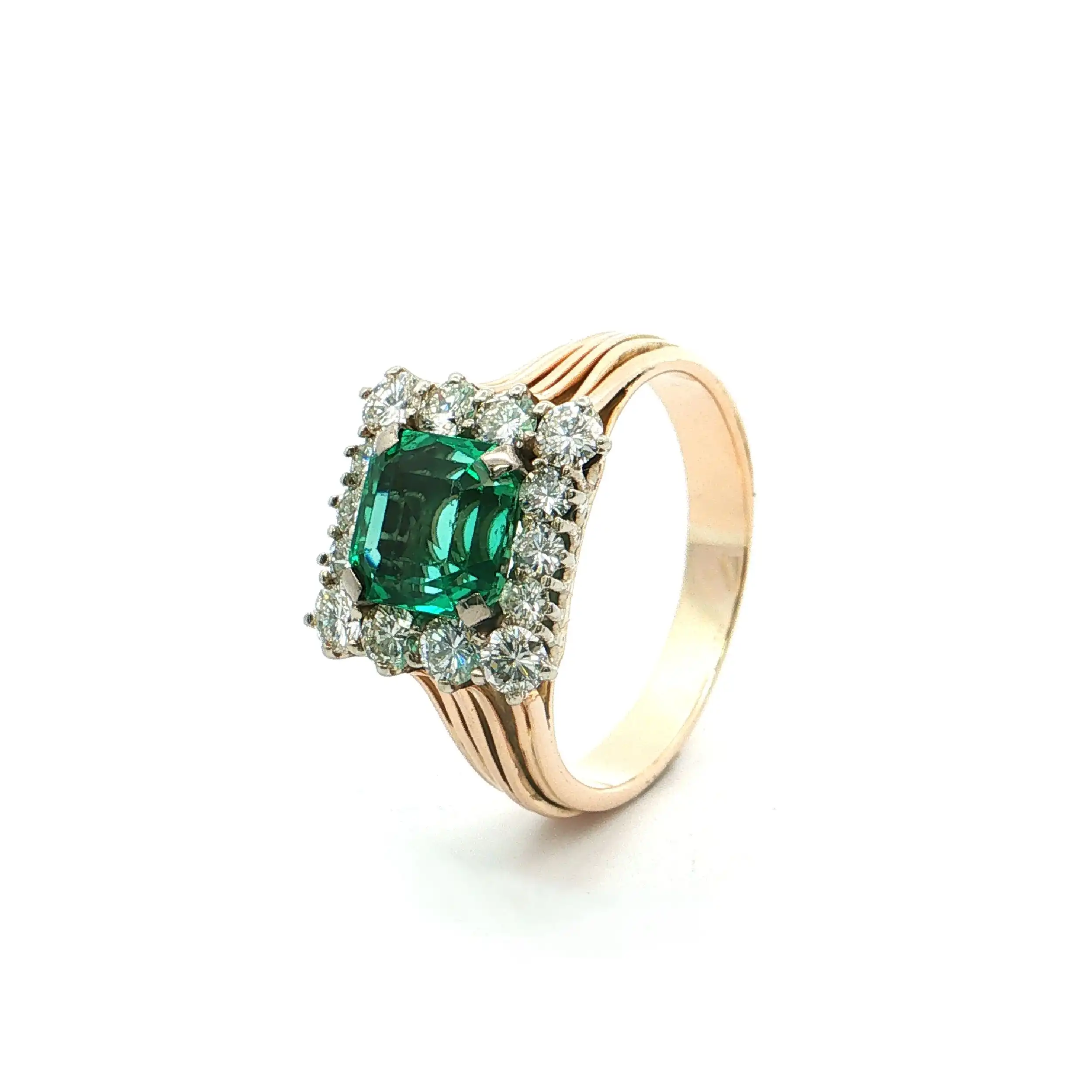 Ring Bicolor mit grünem Farbstein und Brillanten Ring Bicolor mit grünem Farbstein und Brillanten