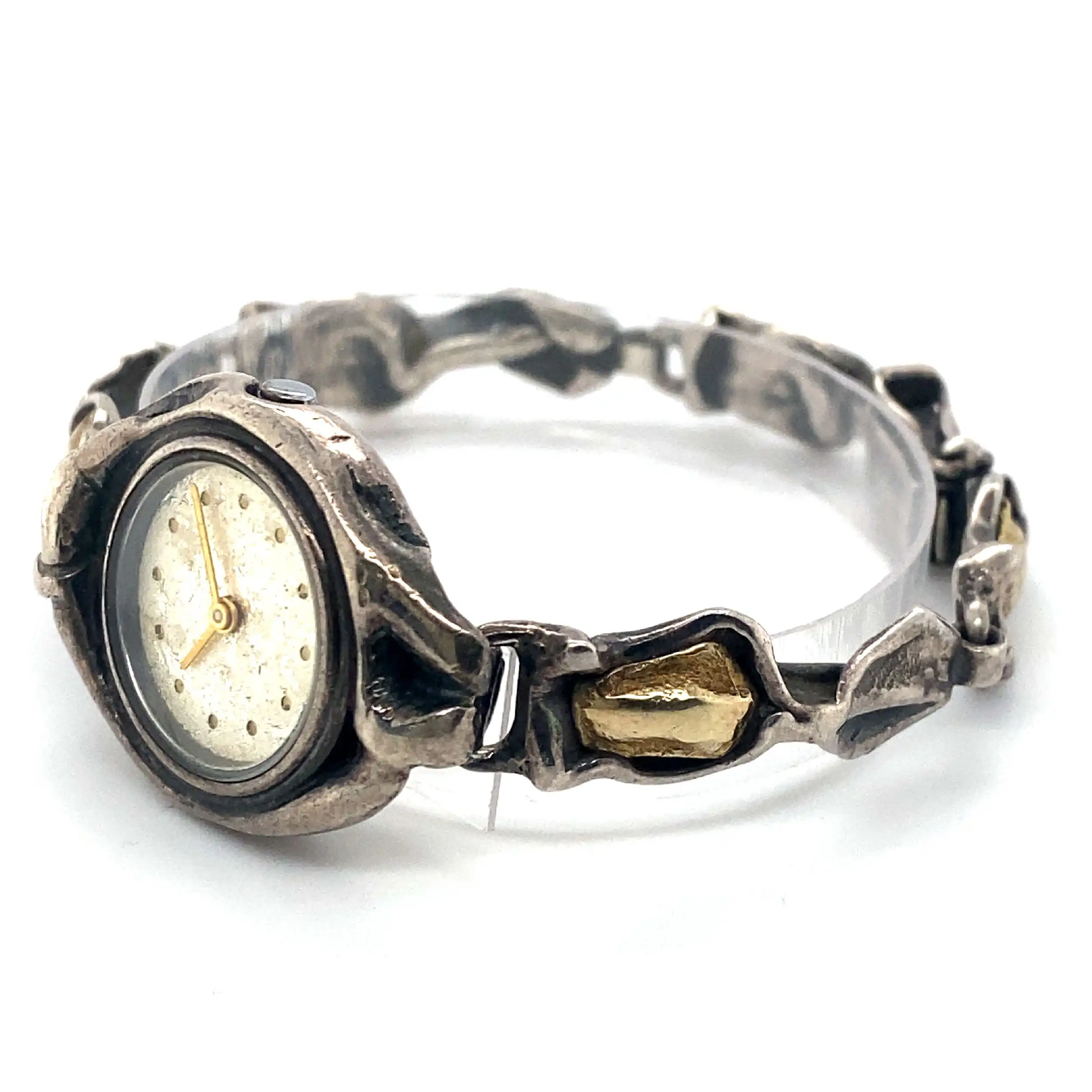 Damenuhr Silber mit goldenen Elementen Damenuhr Silber mit goldenen Elementen