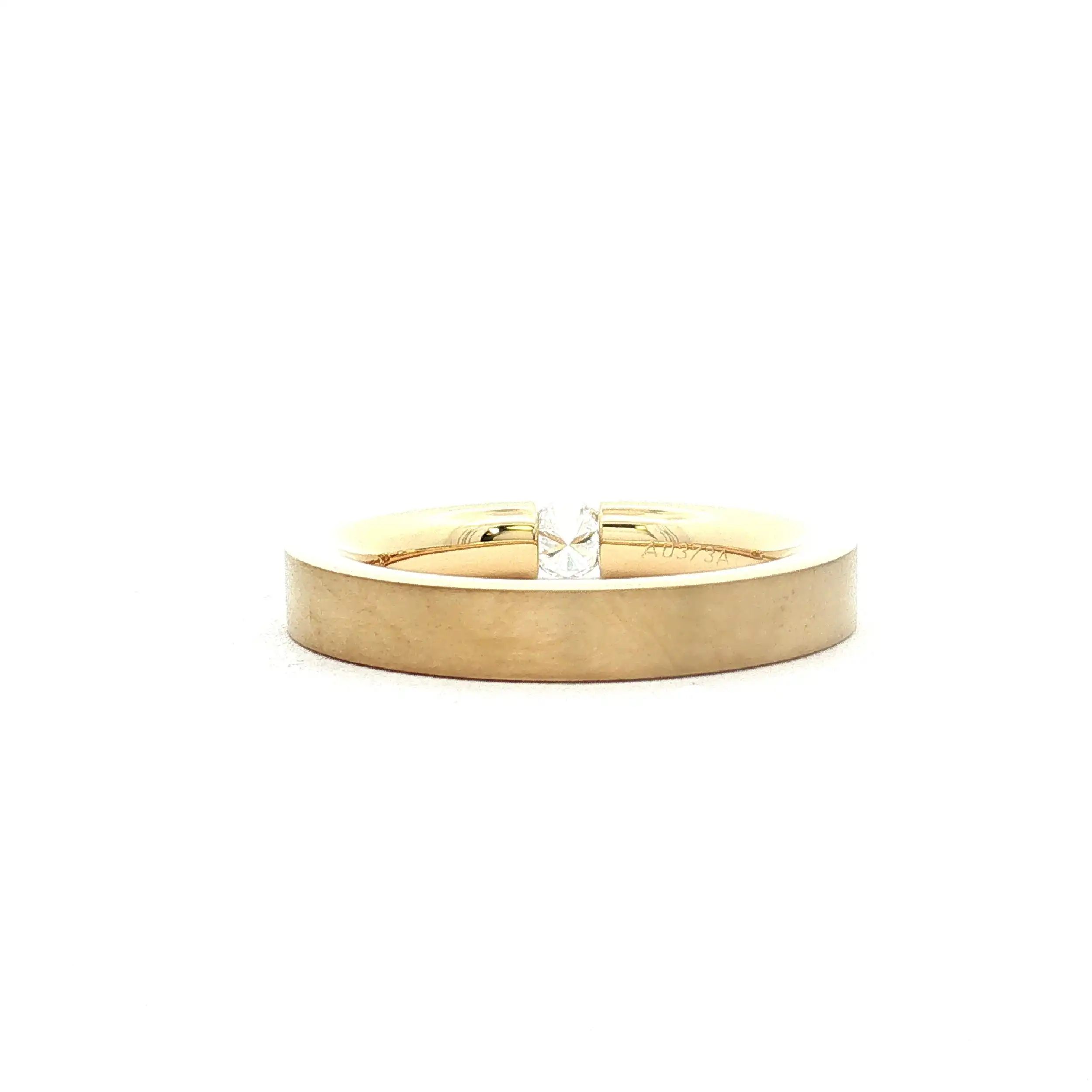 Spannring Gelbgold Niessing flach mit Brillant Solitär