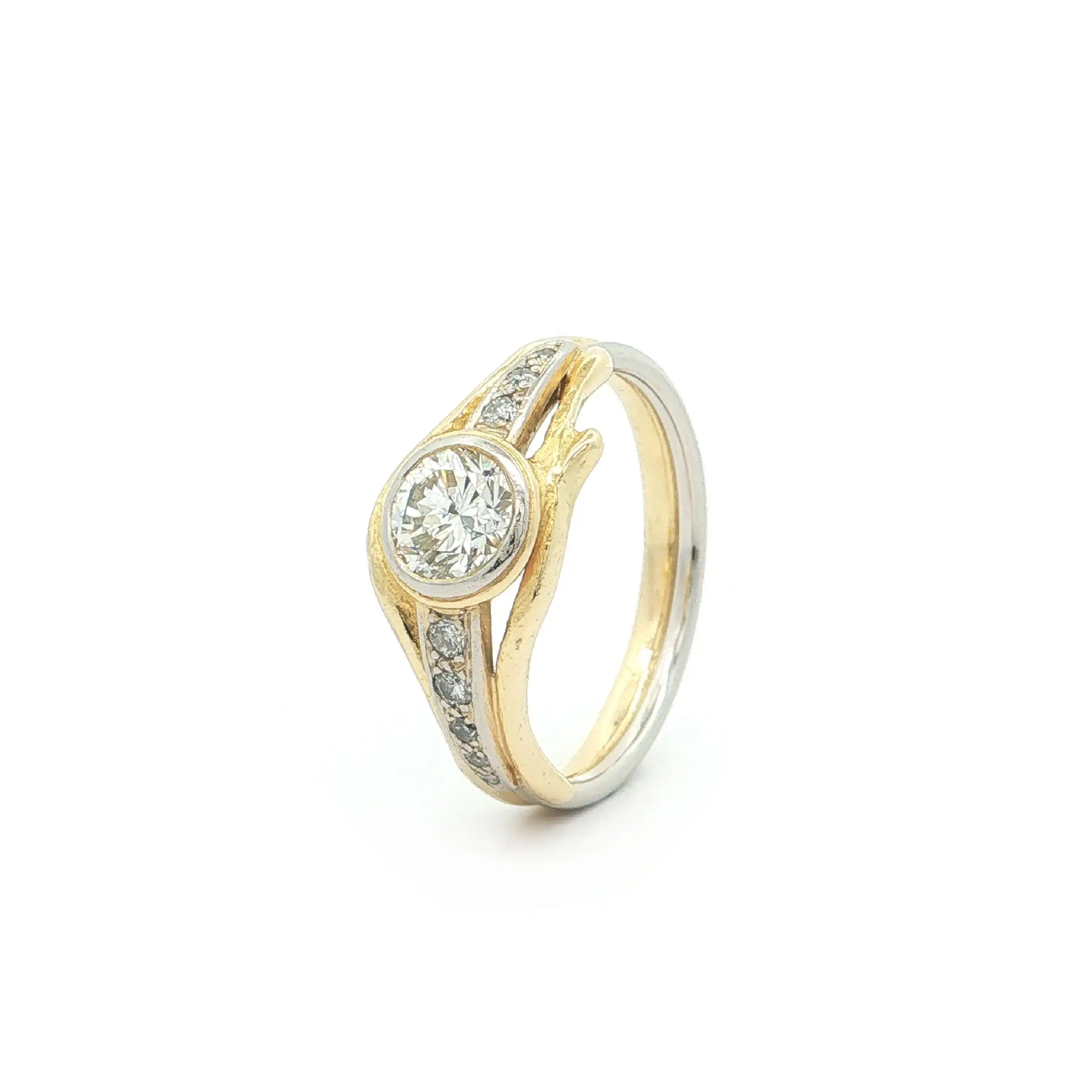 Ring Bicolor mit Brillant und Diamanten