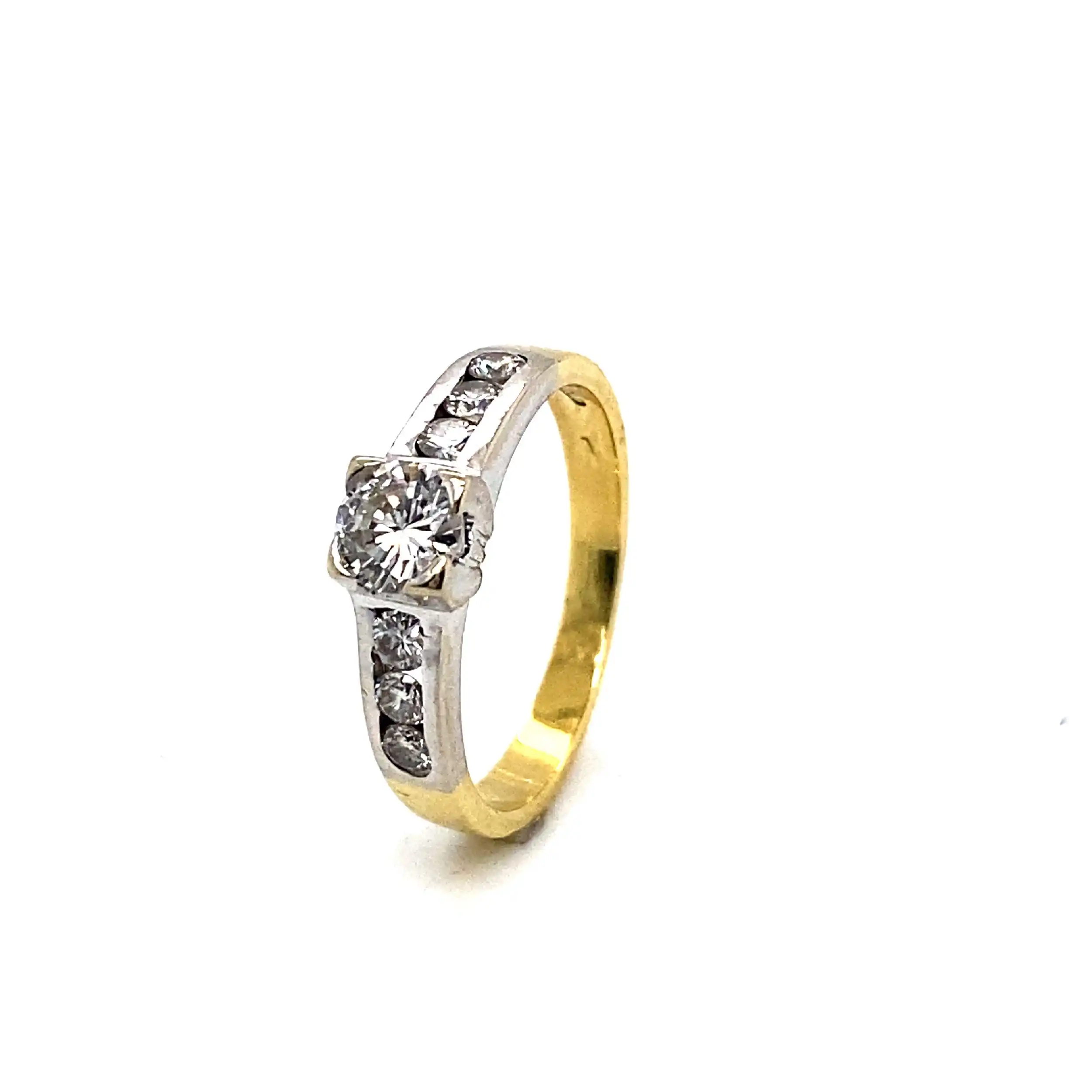 Ring Bicolor mit Solitär Brillant und Melee in Kanalfassung Ring Bicolor mit Solitär Brillant und Melee in Kanalfassung