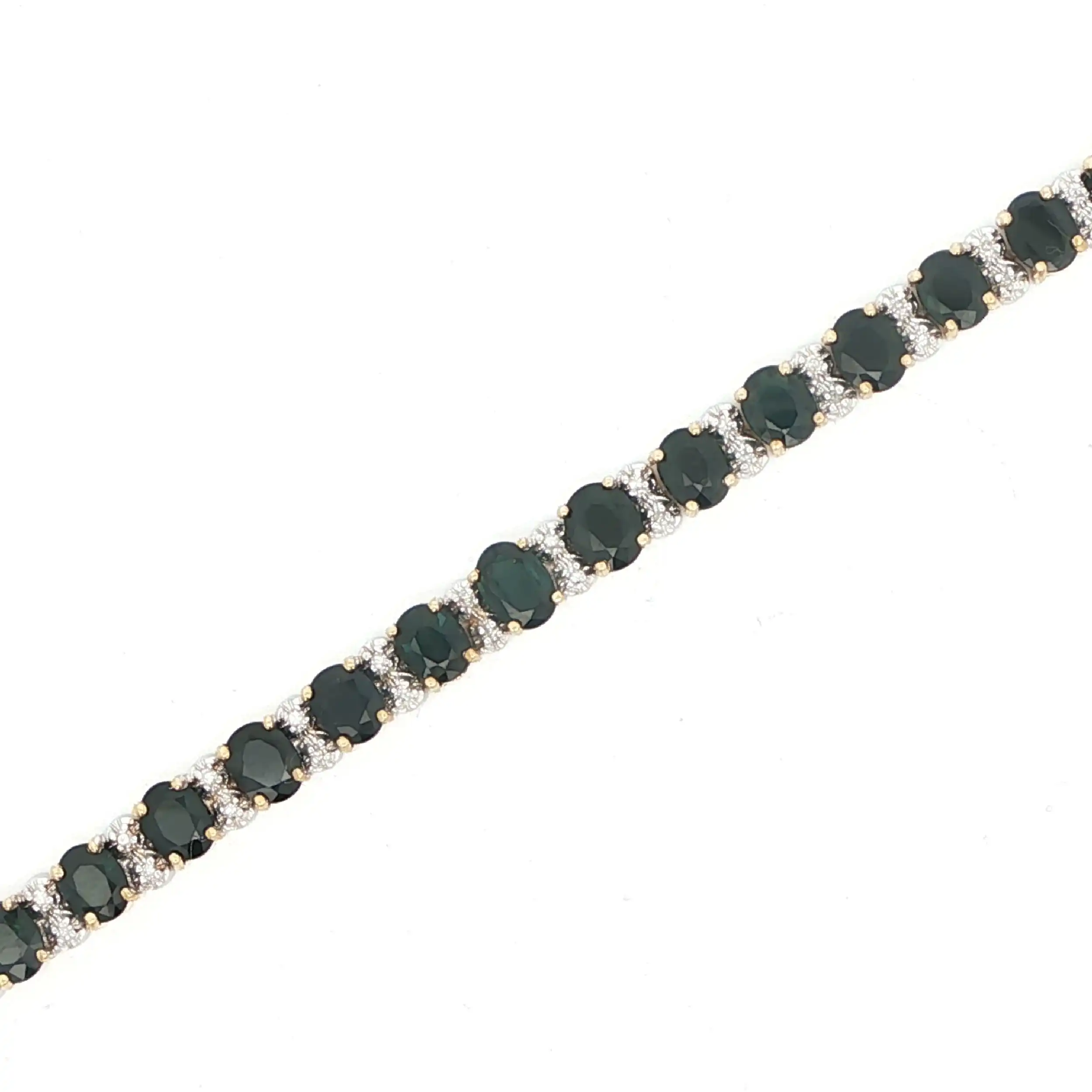Armband Gelbgold mit Brillanten und dunkelgrünen Farbsteinen