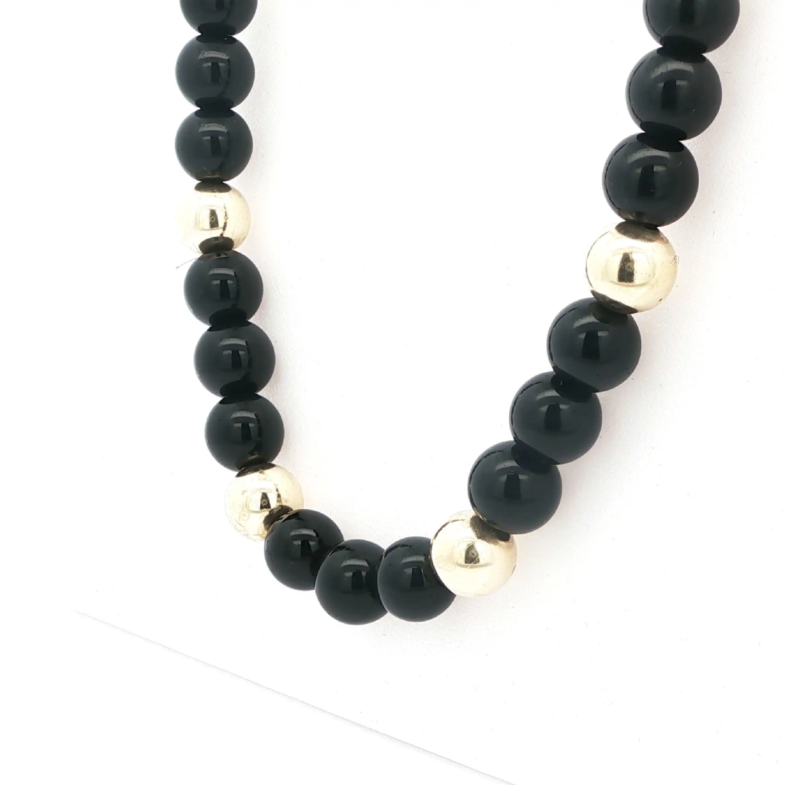 Kette Gelbgold mit schwarzen Kugeln Kette Gelbgold mit schwarzen Kugeln