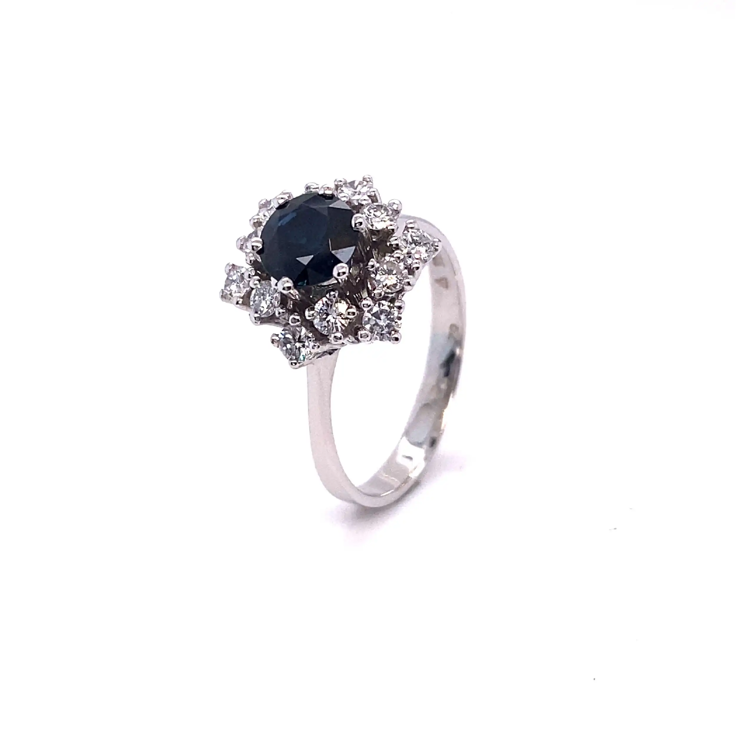 Ring Weißgold mit Brillanten mit 0,70ct. gestempelt und blauem Farbstein Ring Weißgold mit Brillanten mit 0,70ct. gestempelt und blauem Farbstein