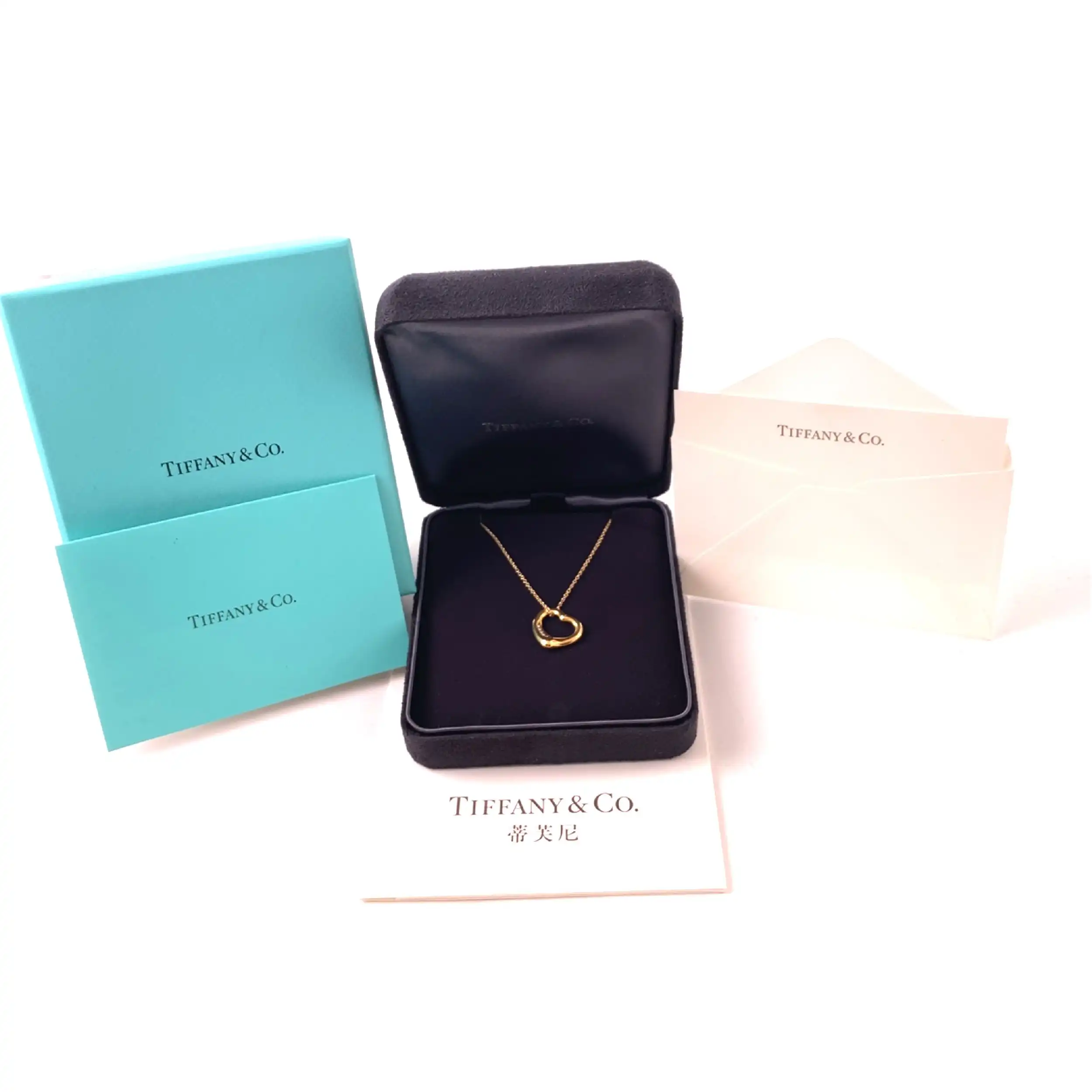 Ankerkette Gelbgold mit Herzanhänger graviert mit 0,02ct. Tiffany & Co. Ankerkette Gelbgold mit Herzanhänger graviert mit 0,02ct. Tiffany & Co.