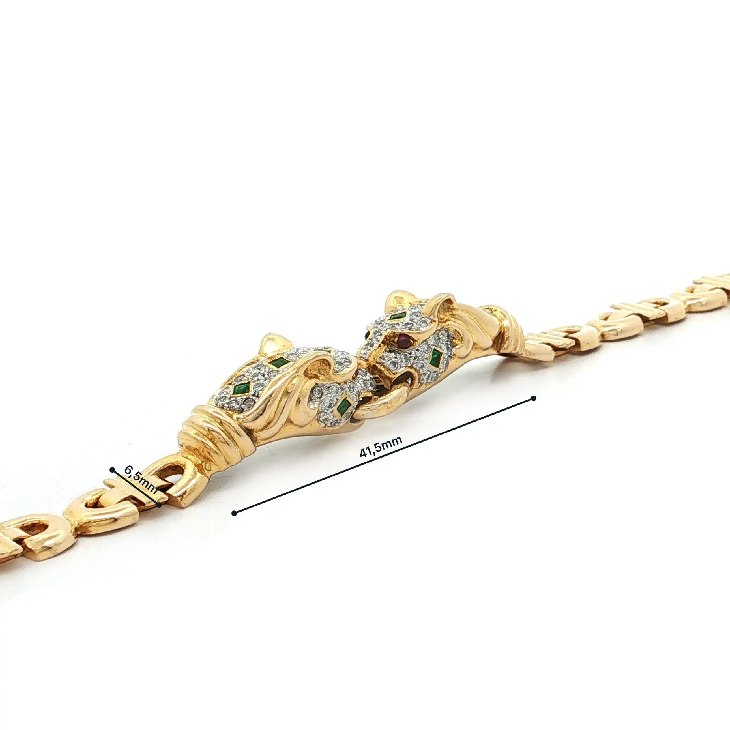 Armband Bicolor mit Brillanten, Smaragden und Rubinen Armband Bicolor mit Brillanten, Smaragden und Rubinen