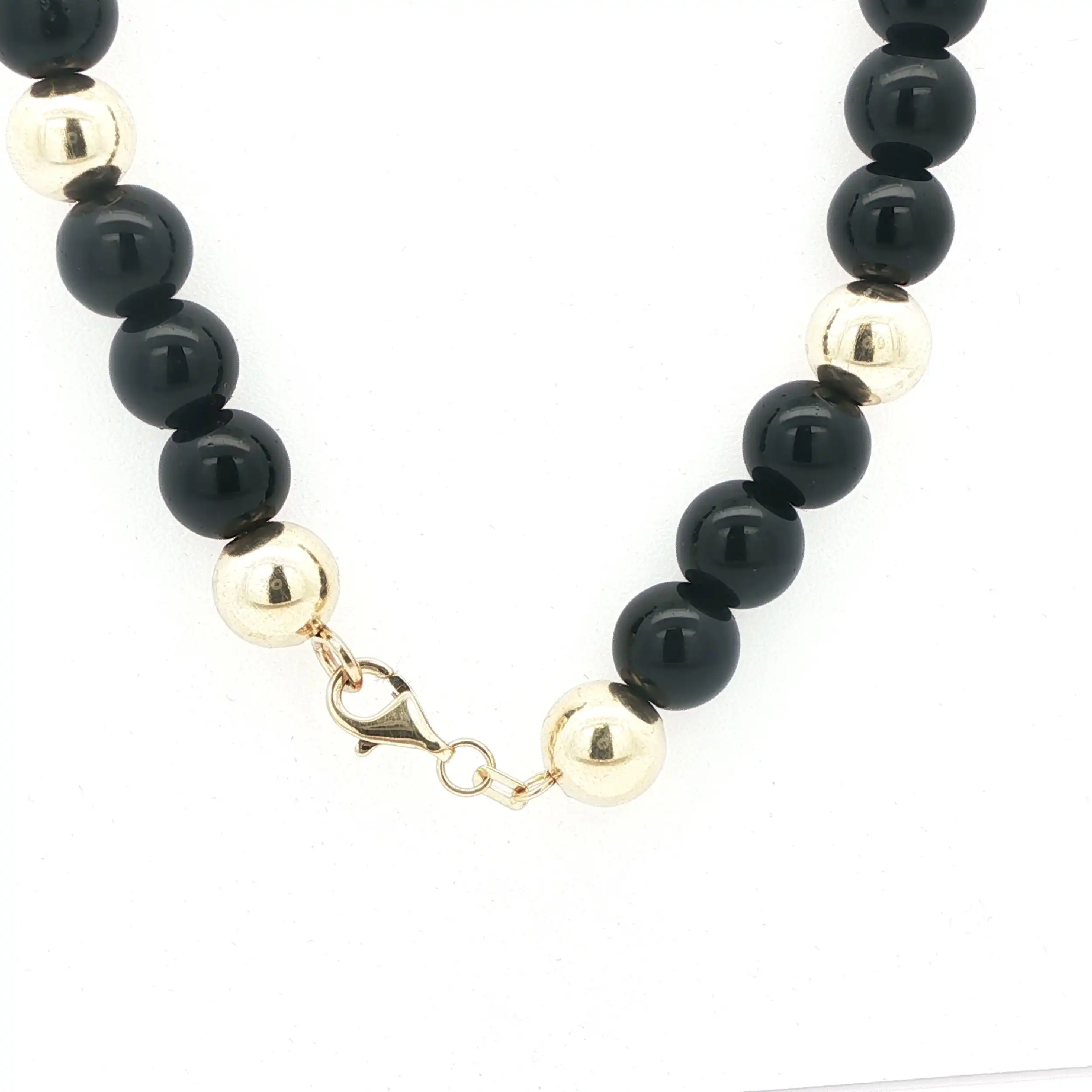 Kette Gelbgold mit schwarzen Kugeln