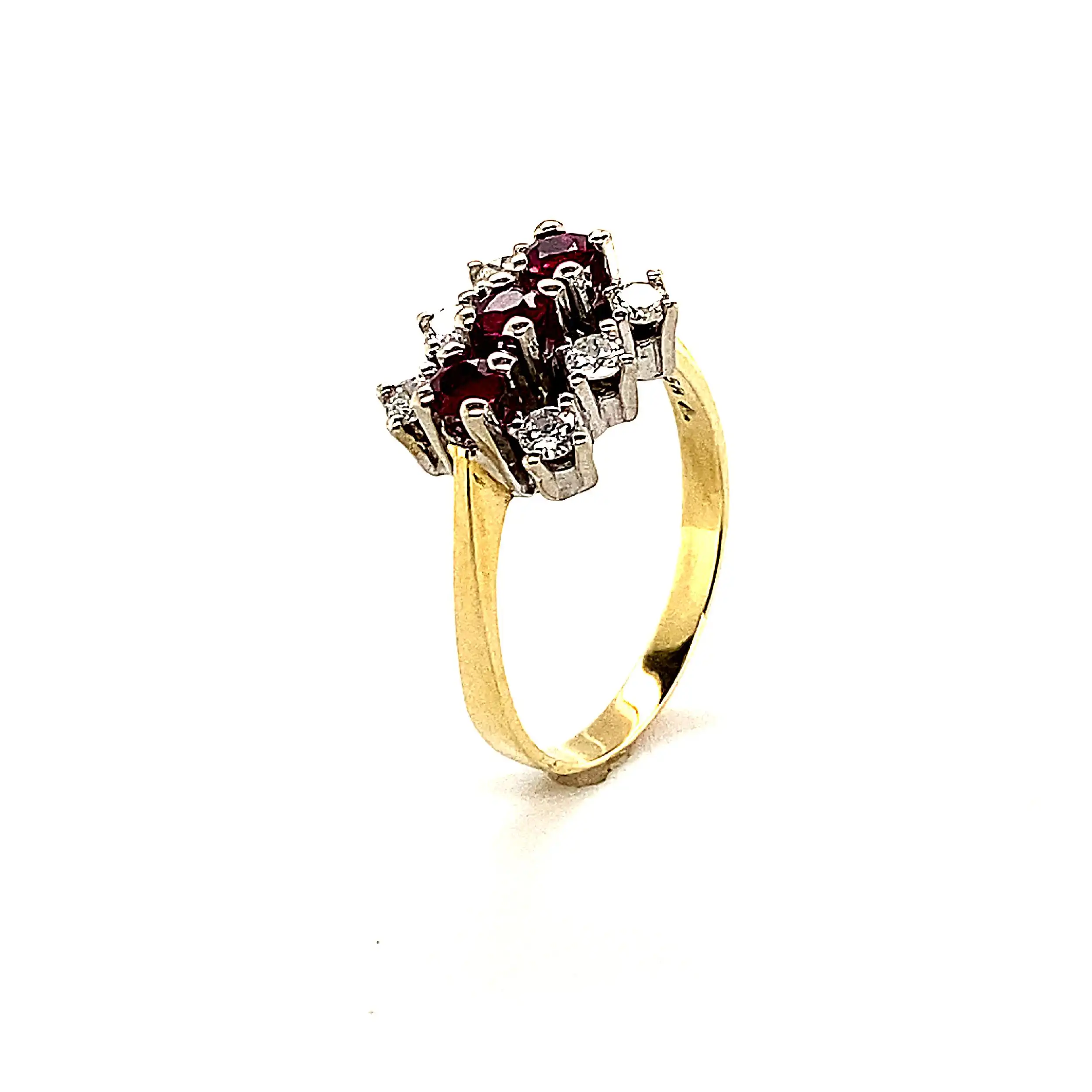 Ring Bicolor mit roten Steinen und Brillanten Ring Bicolor mit roten Steinen und Brillanten