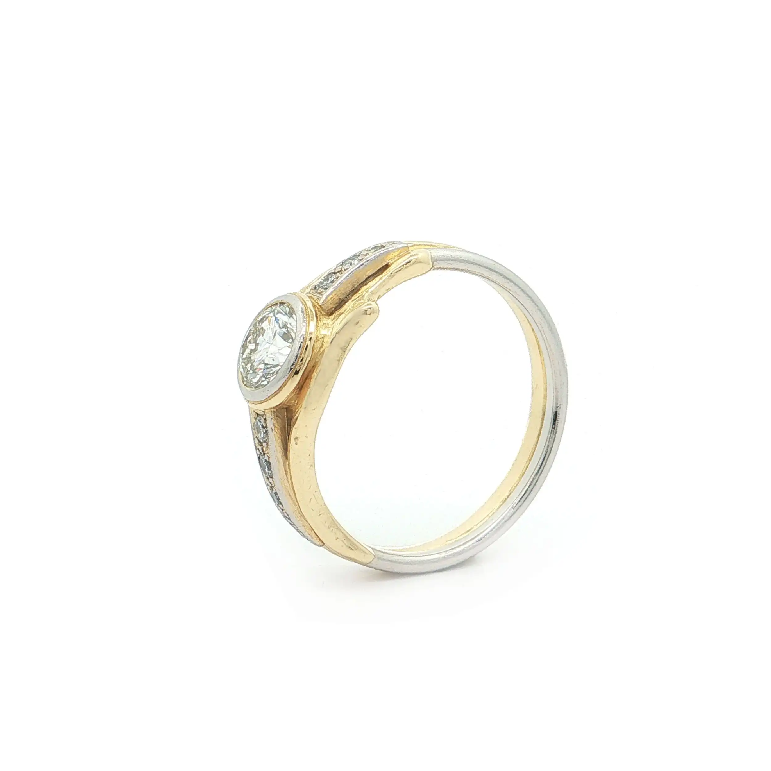 Ring Bicolor mit Brillant und Diamanten