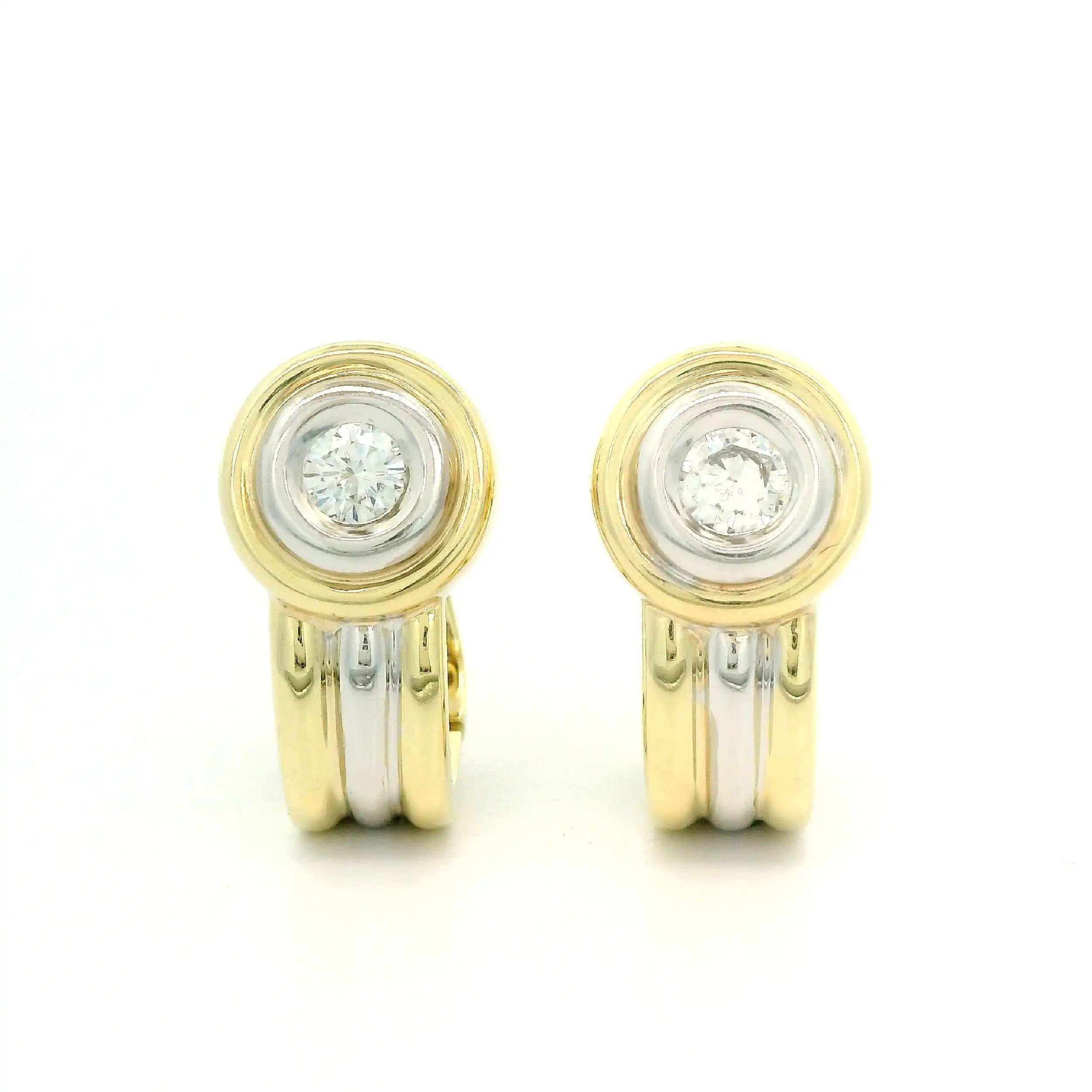 Ohrclips Bicolor mit Brillanten, graviert mit 0,17 ct je Seite Ohrclips Bicolor mit Brillanten, graviert mit 0,17 ct je Seite