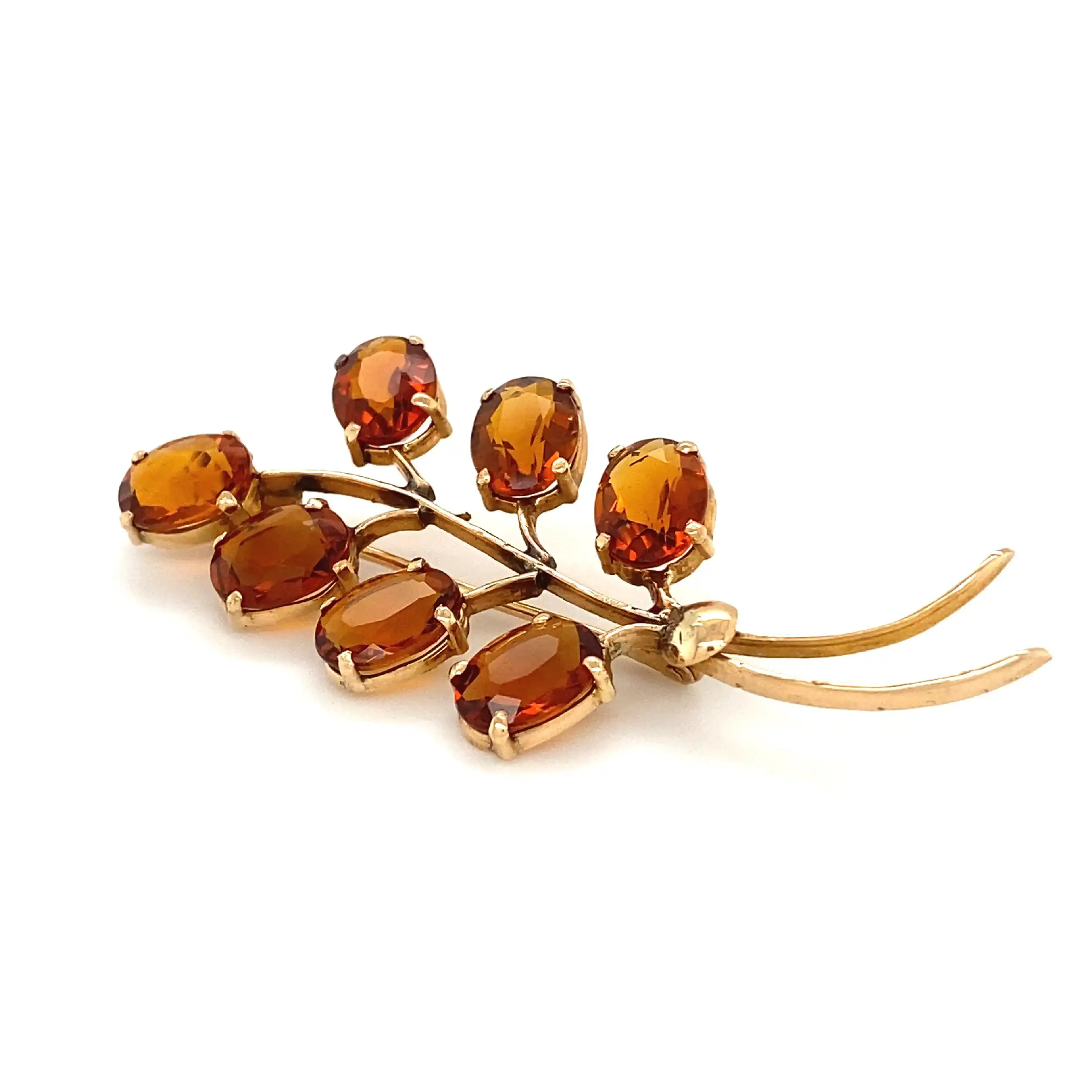 Brosche mit orangenen Farbsteinen Brosche mit orangenen Farbsteinen