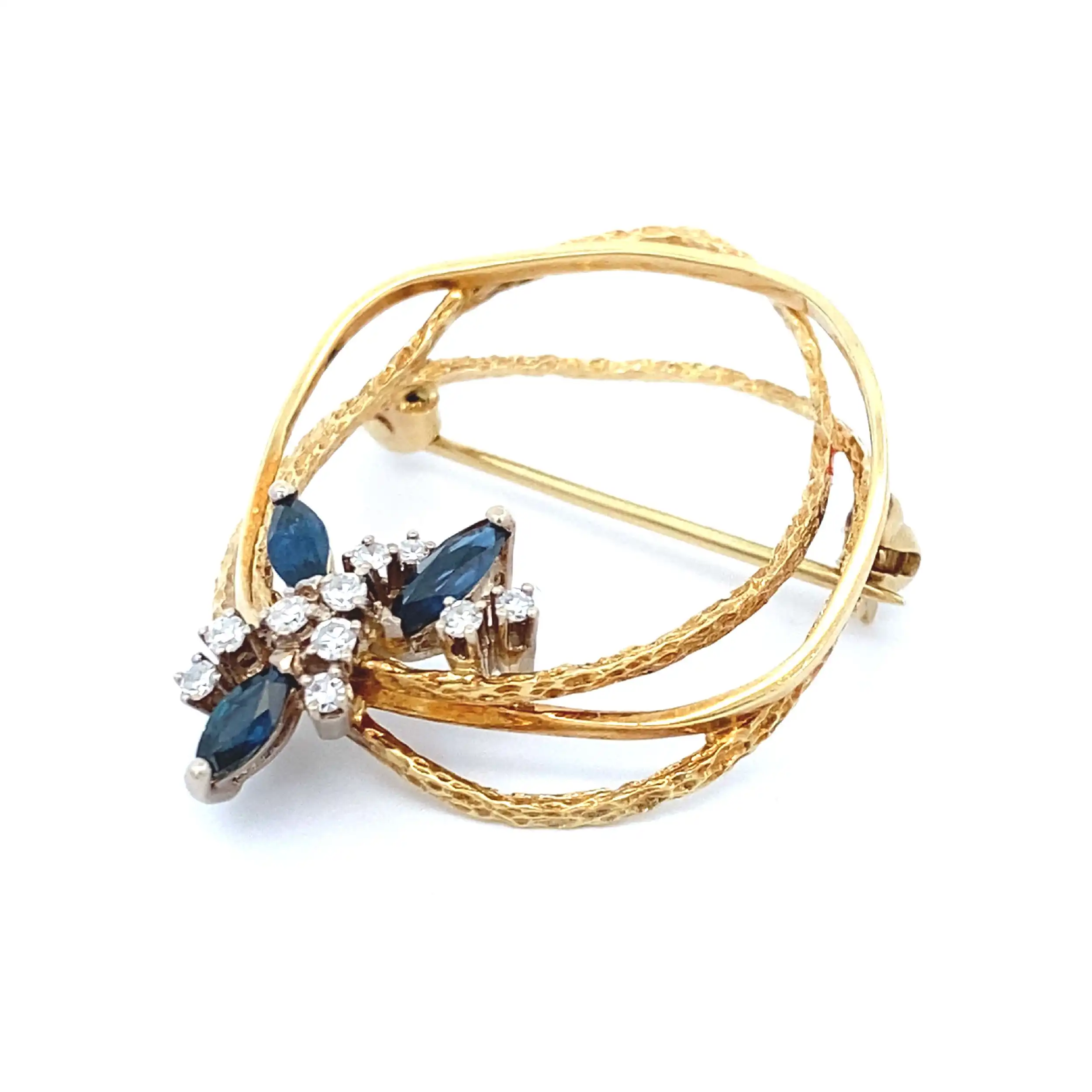 Brosche Bicolor mit Saphiren und Diamanten