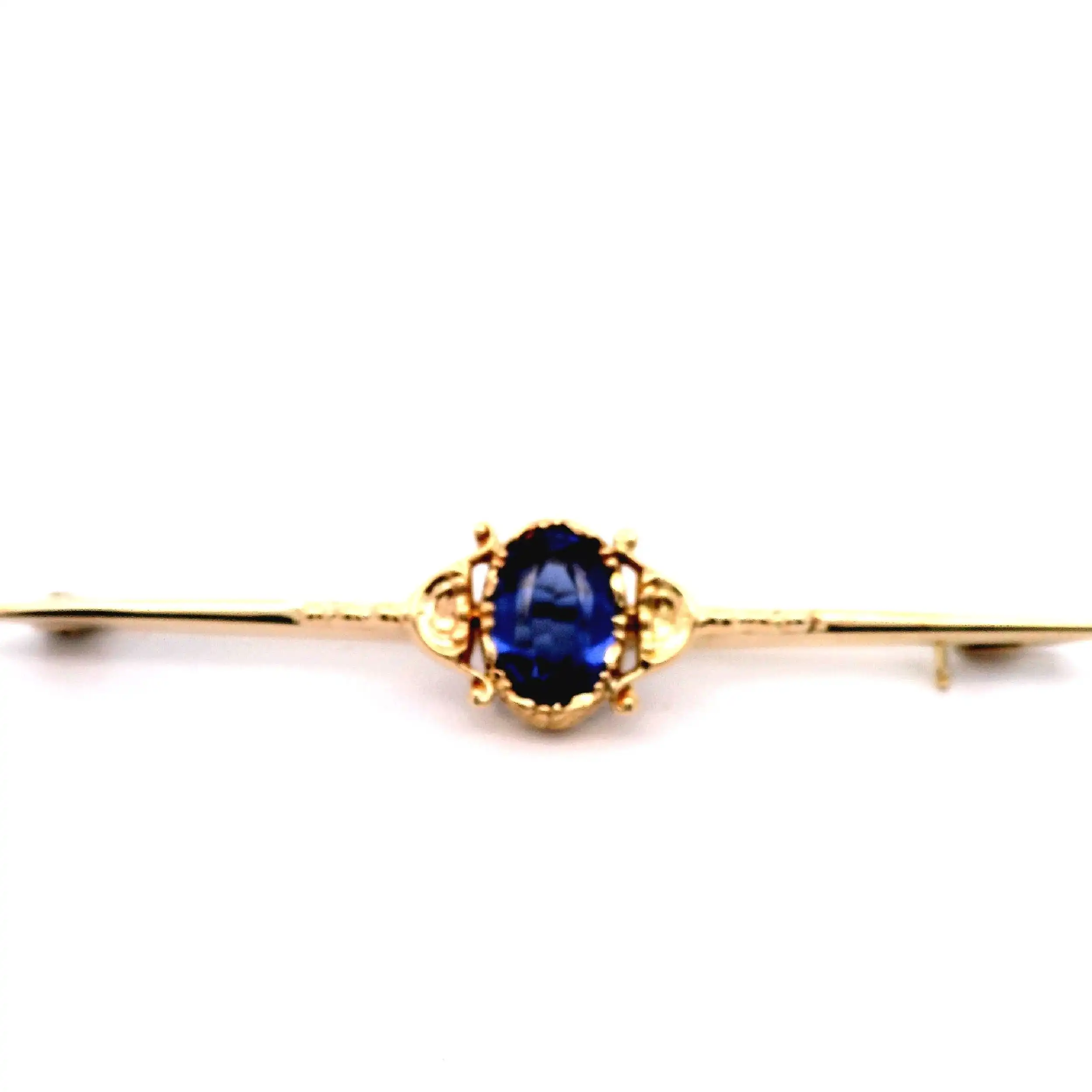 Anstecknadel Gelbgold mit synthetischem Saphir