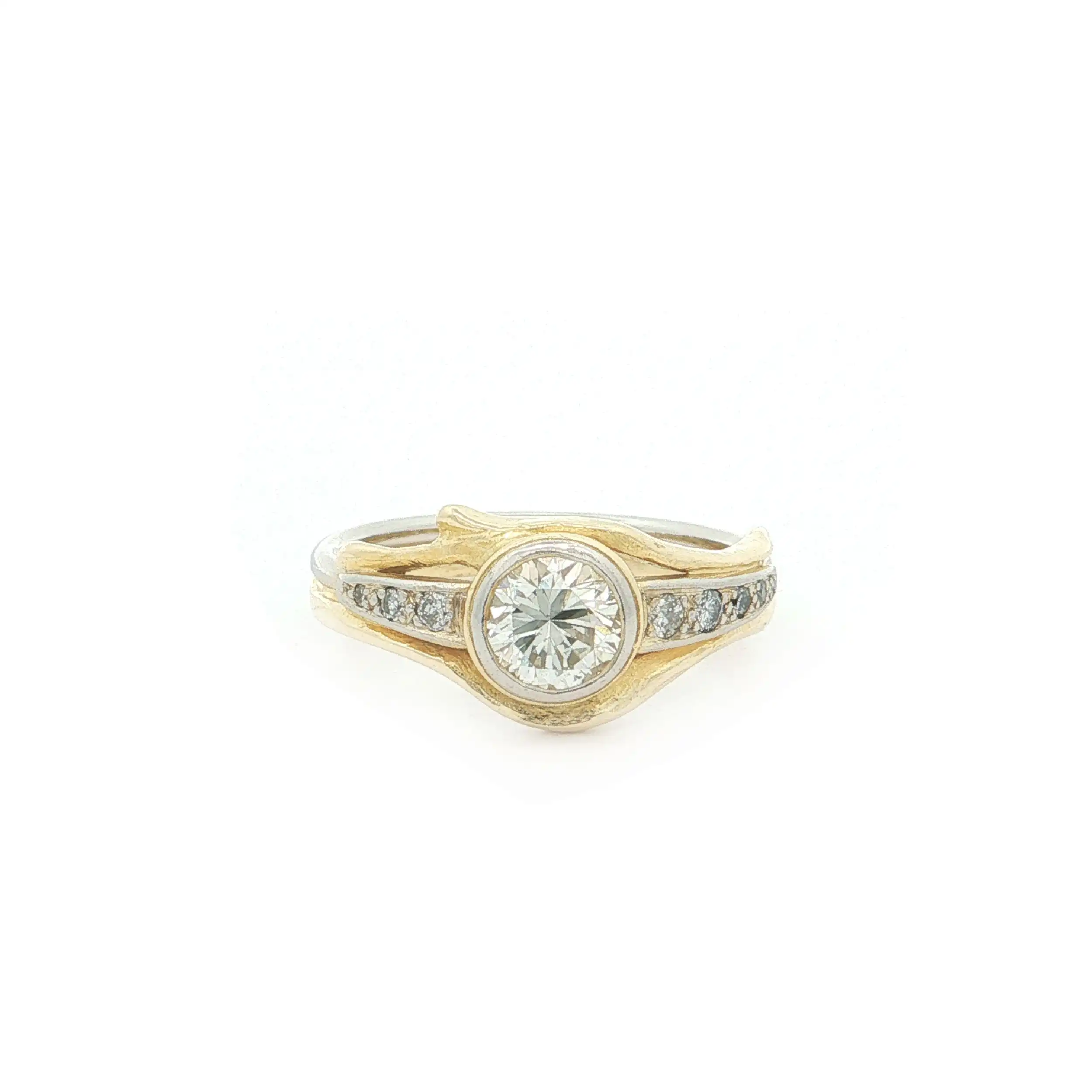 Ring Bicolor mit Brillant und Diamanten