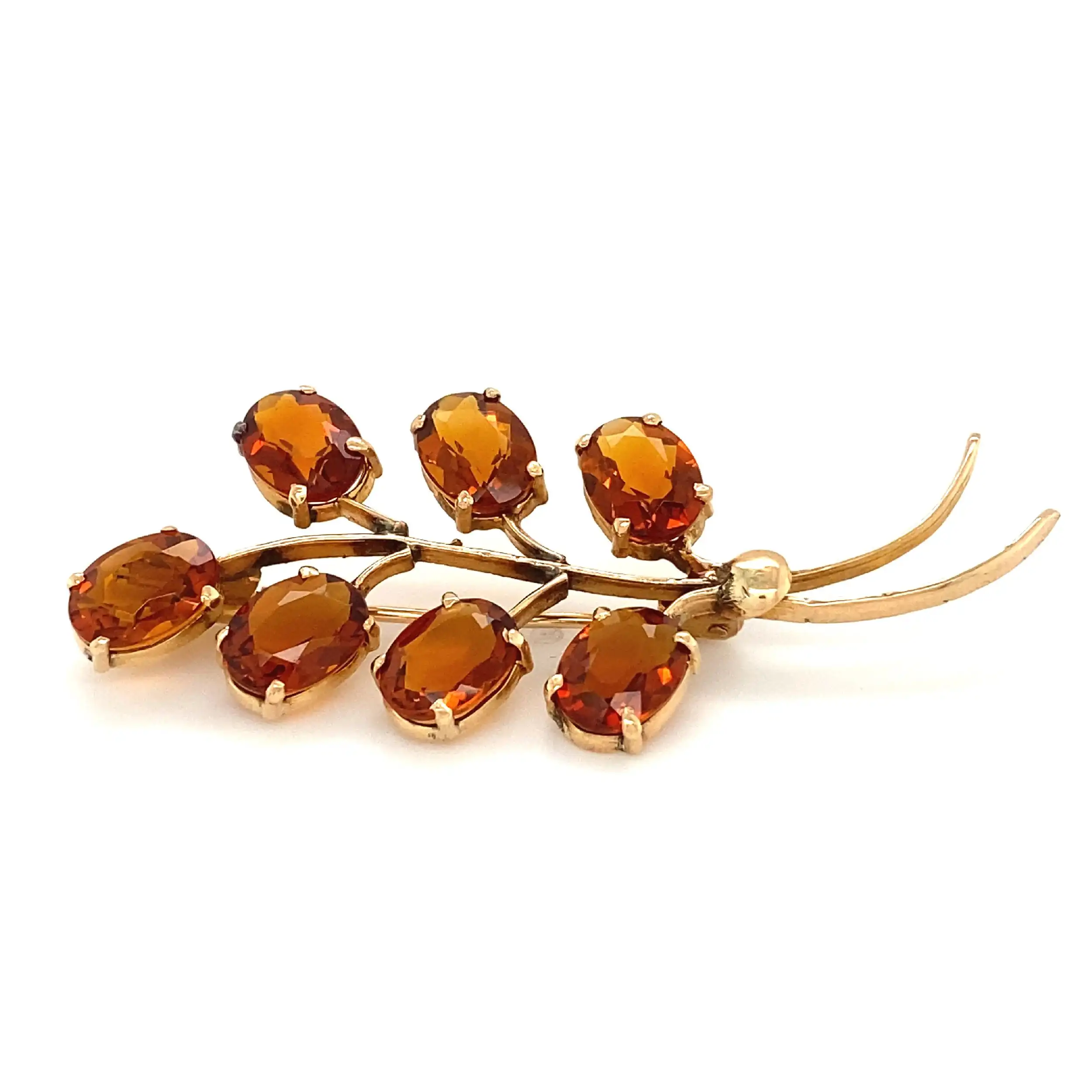 Brosche mit orangenen Farbsteinen Brosche mit orangenen Farbsteinen