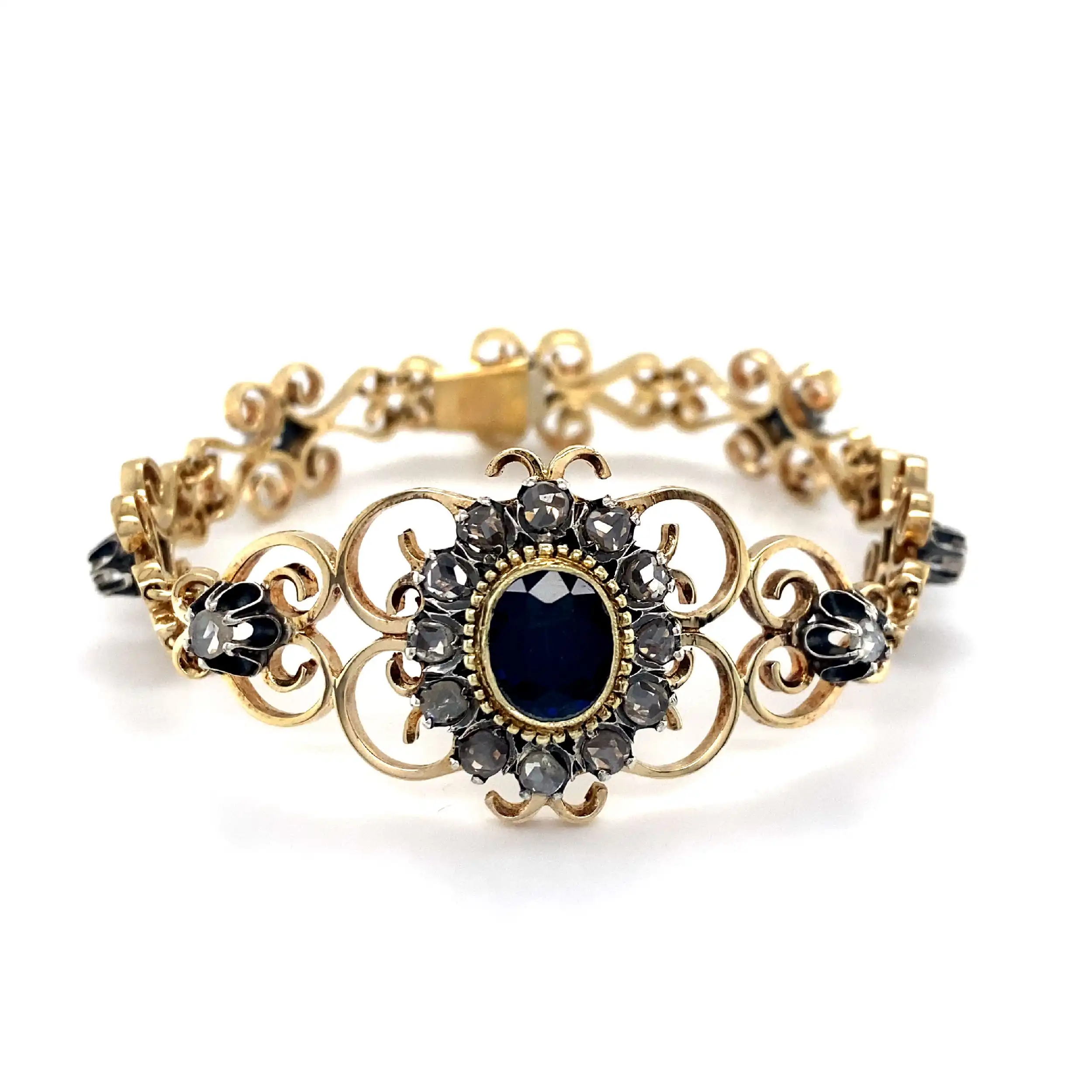 Armband Gelbgold mit Rosen und Saphirdoublette in Silberfasung Armband Gelbgold mit Rosen und Saphirdoublette in Silberfasung