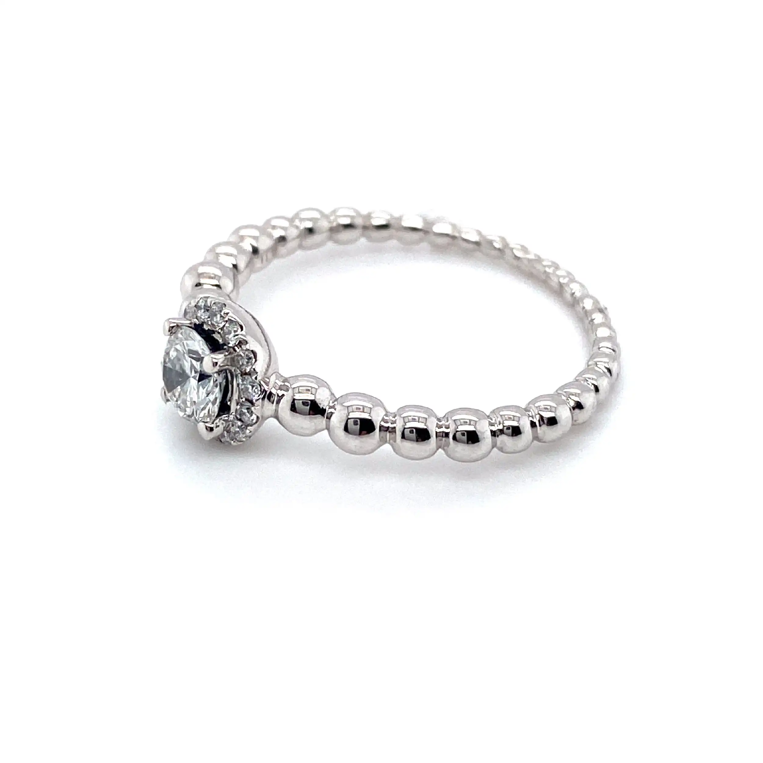 Ring Weißgold mit Solitär 0,35ct und 14 Brillanten zus. 0,11ct TW/Si Ring Weißgold mit Solitär 0,35ct und 14 Brillanten zus. 0,11ct TW/Si
