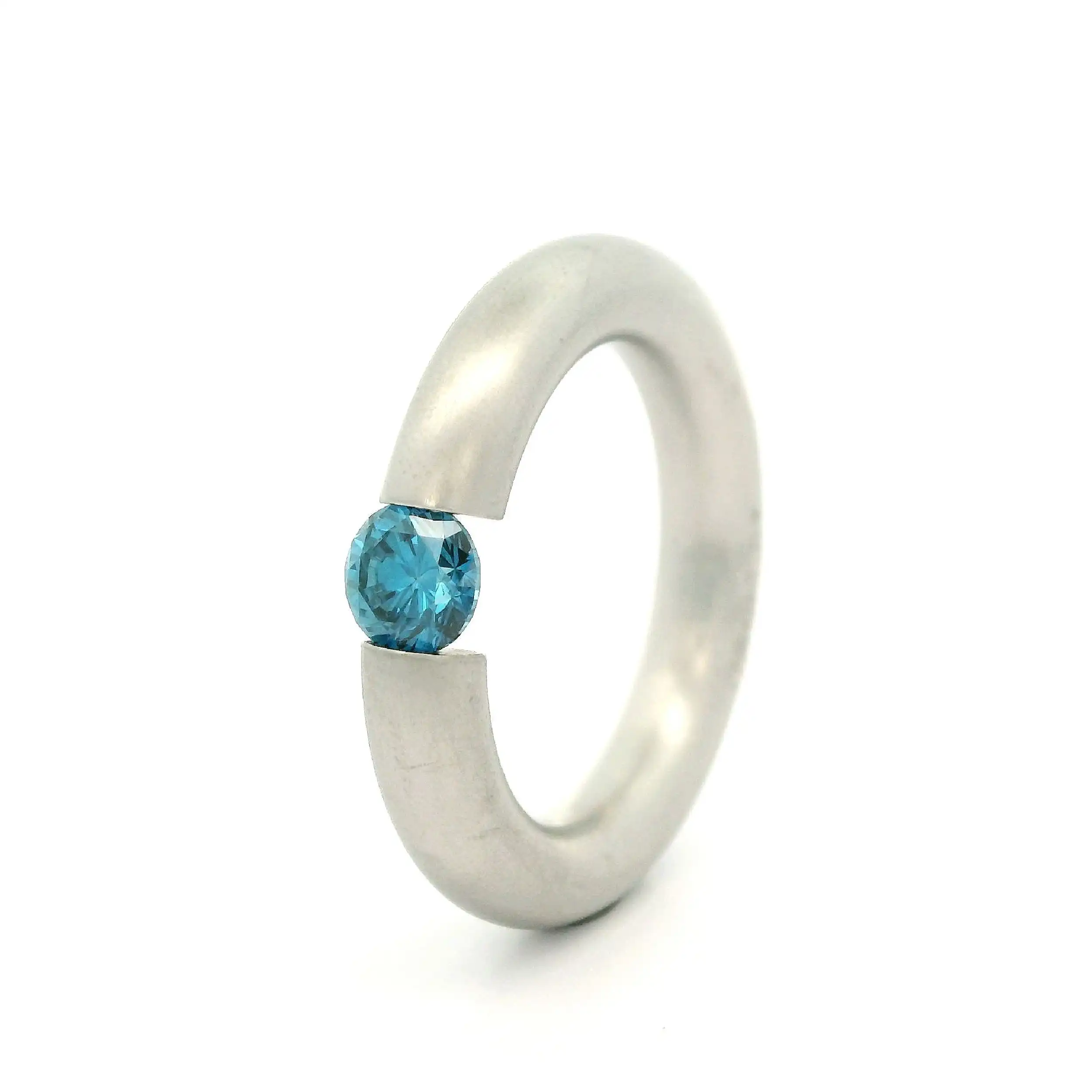 Spannring Platin mit blauem Brillanten "Niessing" Spannring Platin mit blauem Brillanten "Niessing"
