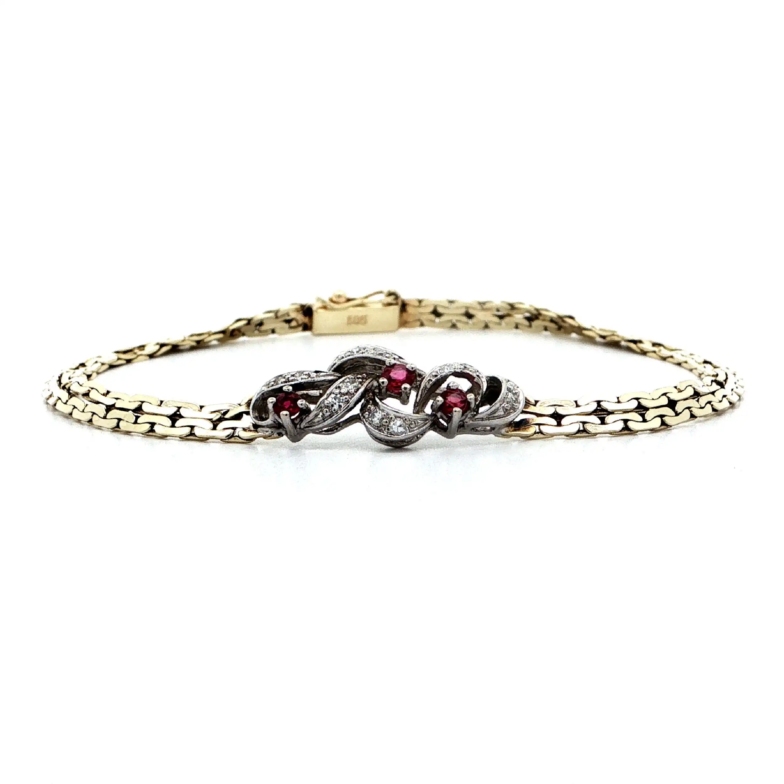 Armband Bicolor mit Rubinen & Diamanten, graviert mit 0,06ct. Armband Bicolor mit Rubinen & Diamanten, graviert mit 0,06ct.