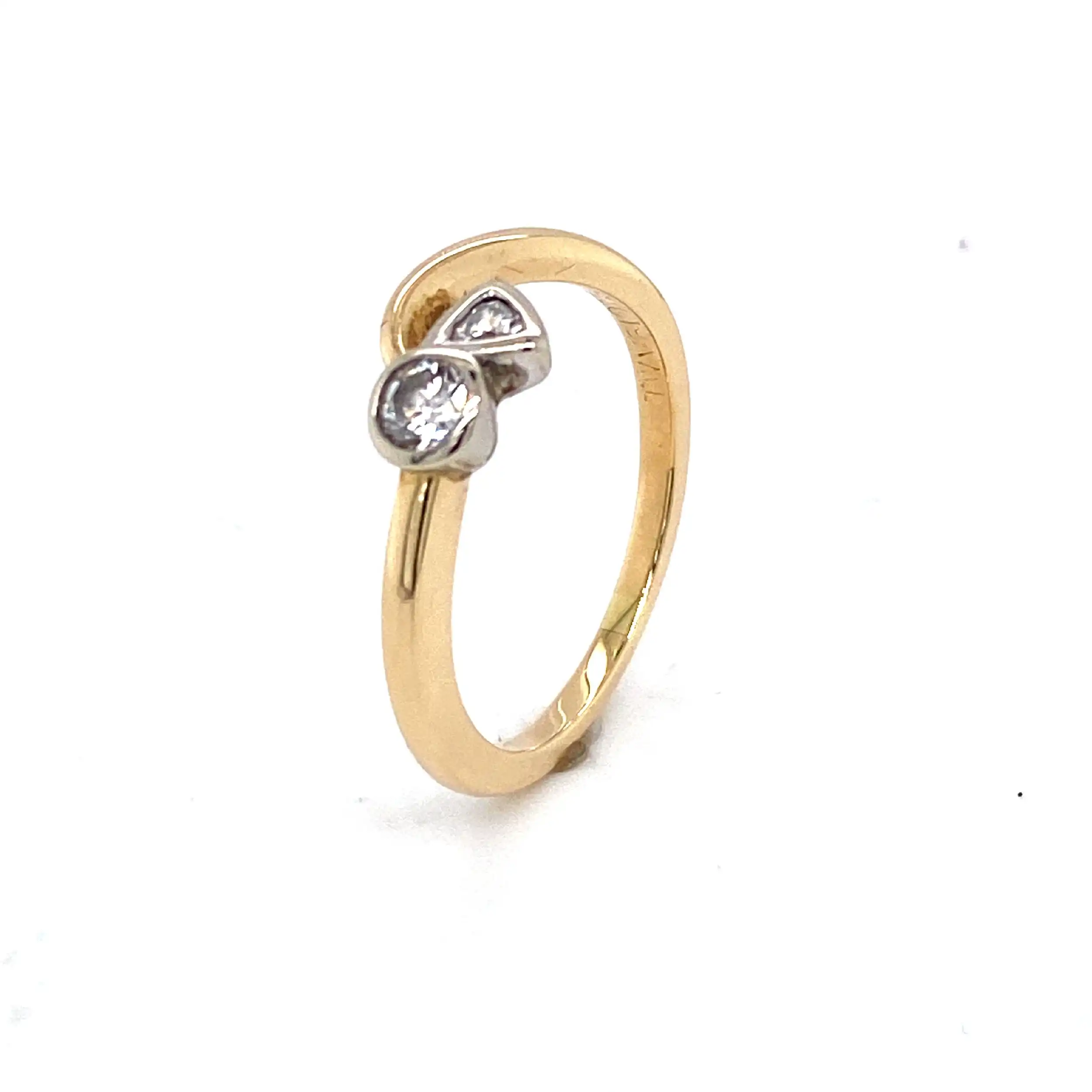 Ring Bicolor mit Brillant und Diamant, graviert 0,29ct. Ring Bicolor mit Brillant und Diamant, graviert 0,29ct.