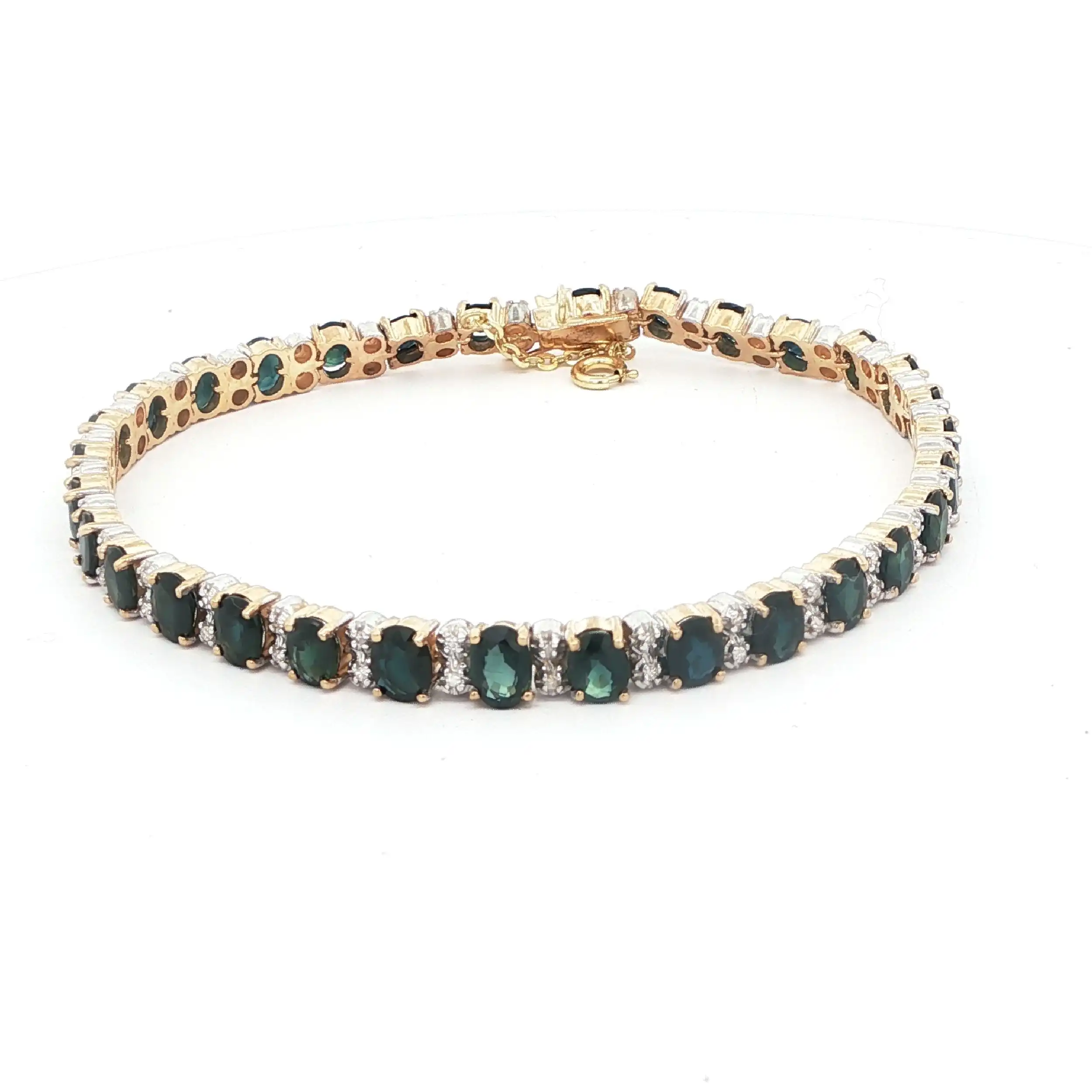 Armband Gelbgold mit Brillanten und dunkelgrünen Farbsteinen