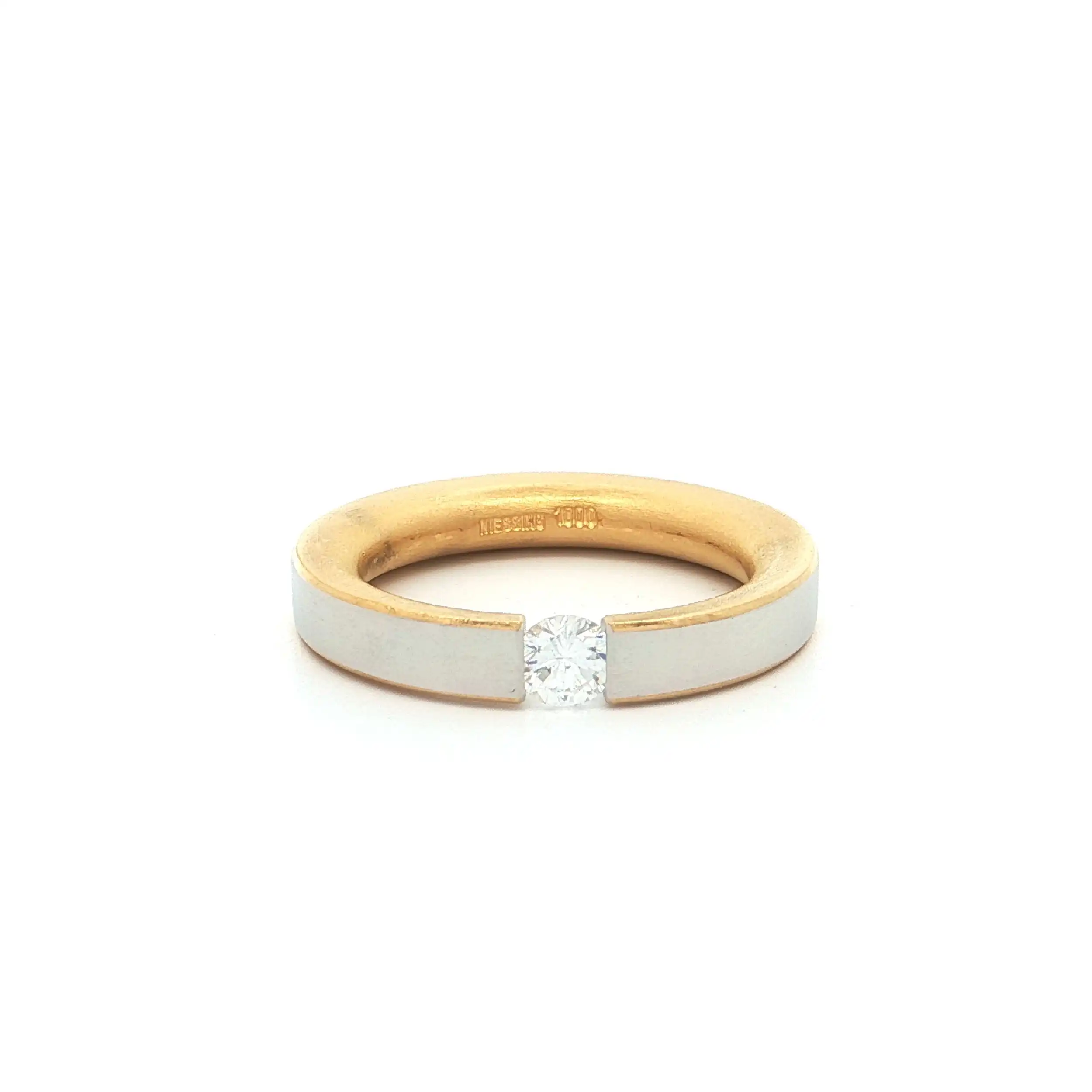 Spannring Bicolor mit Brillant "Niessing"
