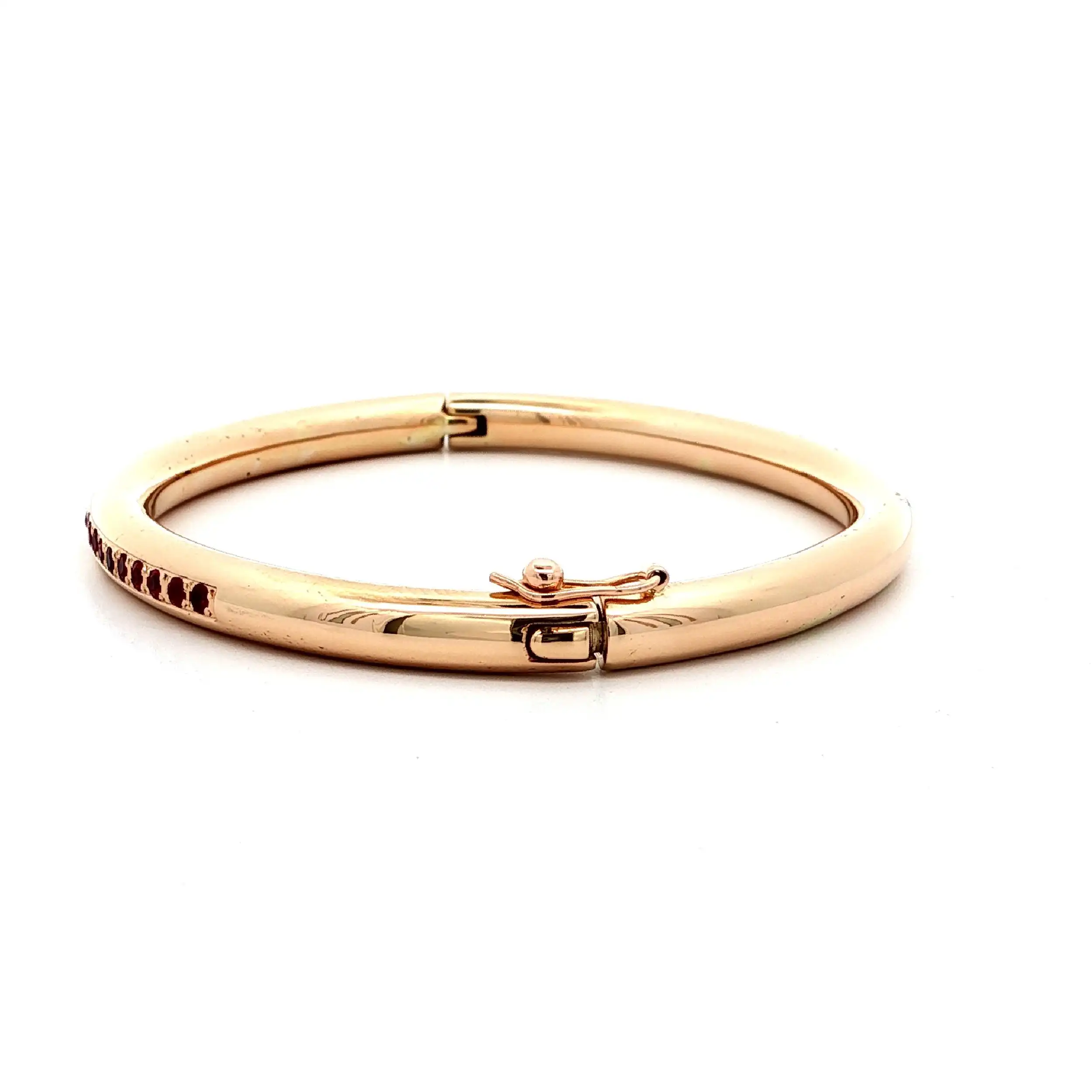 Armreif Gelbgold hohl mit roten Farbsteinen
