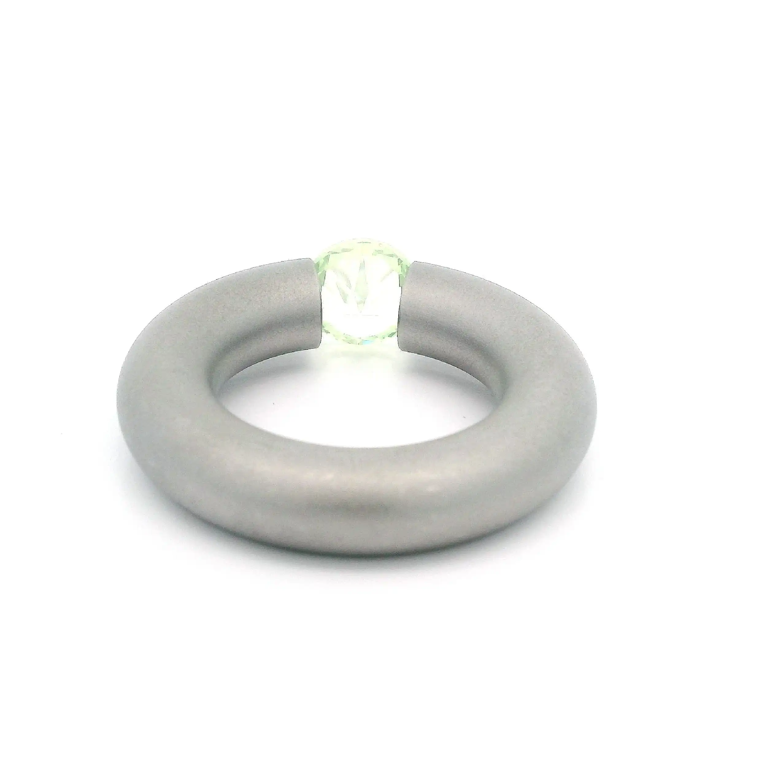 Spannring Edelstahl Niessing mit synthetischem Chrysolith Spannring Edelstahl Niessing mit synthetischem Chrysolith