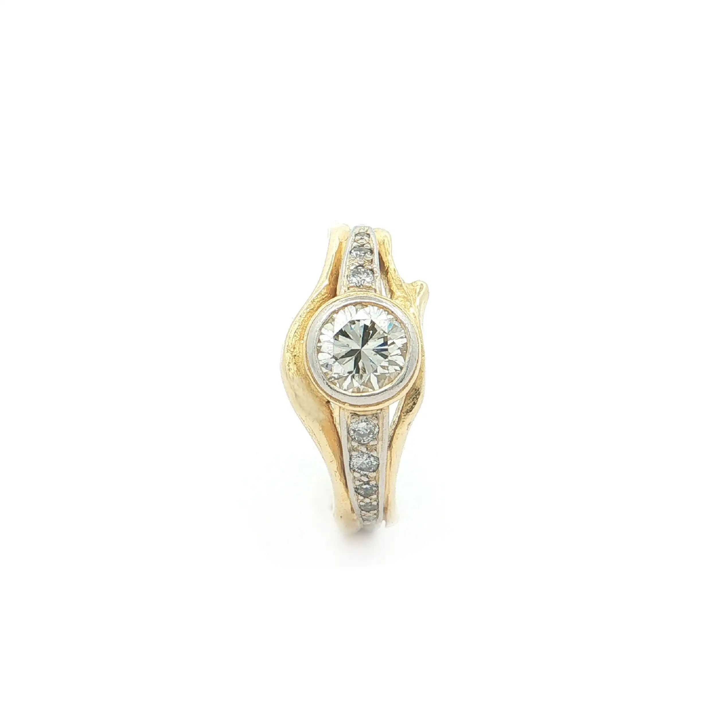 Ring Bicolor mit Brillant und Diamanten