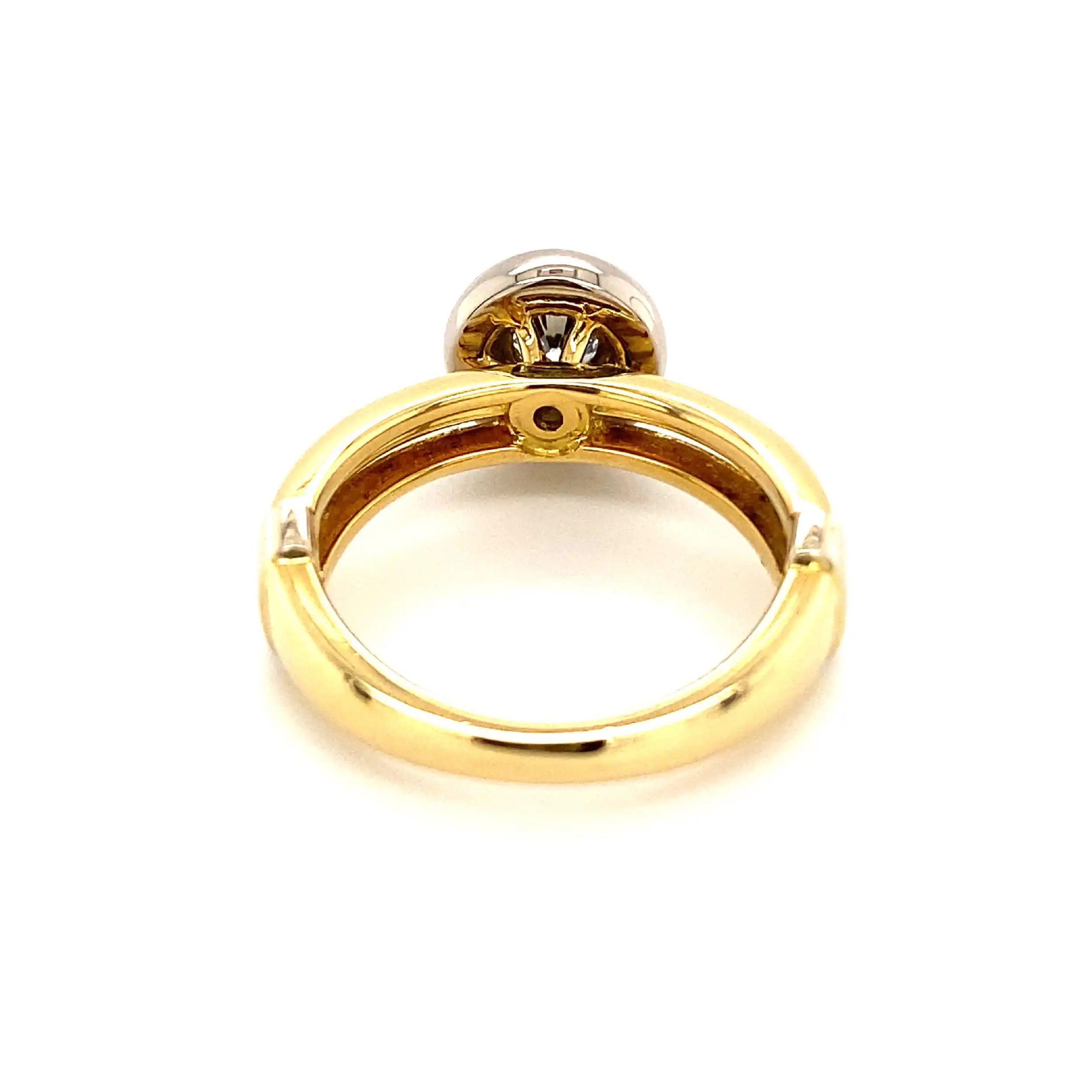 Ring Bicolor mit Brillant Solitär, graviert mit 0,25ct. Ring Bicolor mit Brillant Solitär, graviert mit 0,25ct.