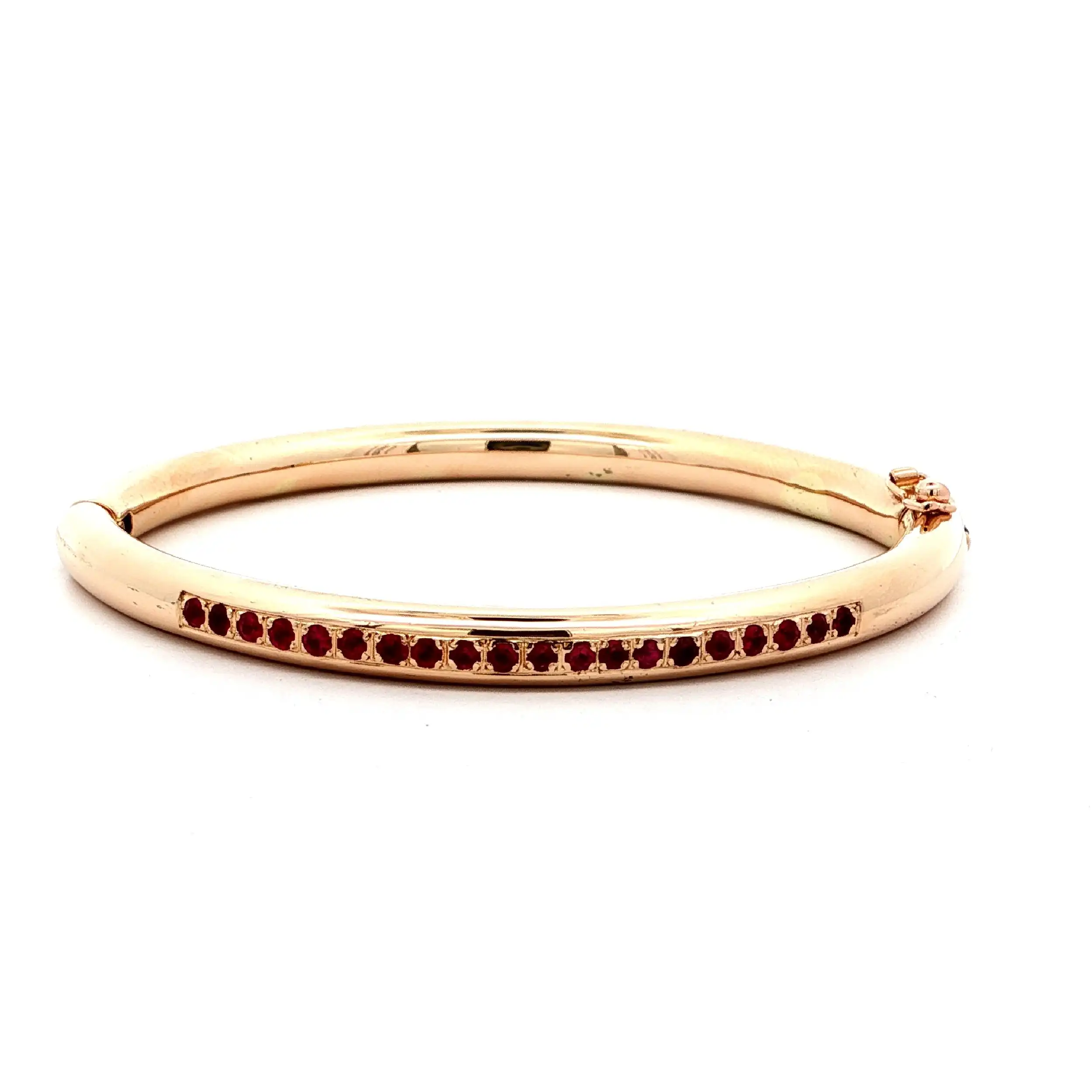 Armreif Gelbgold hohl mit roten Farbsteinen Armreif Gelbgold hohl mit roten Farbsteinen