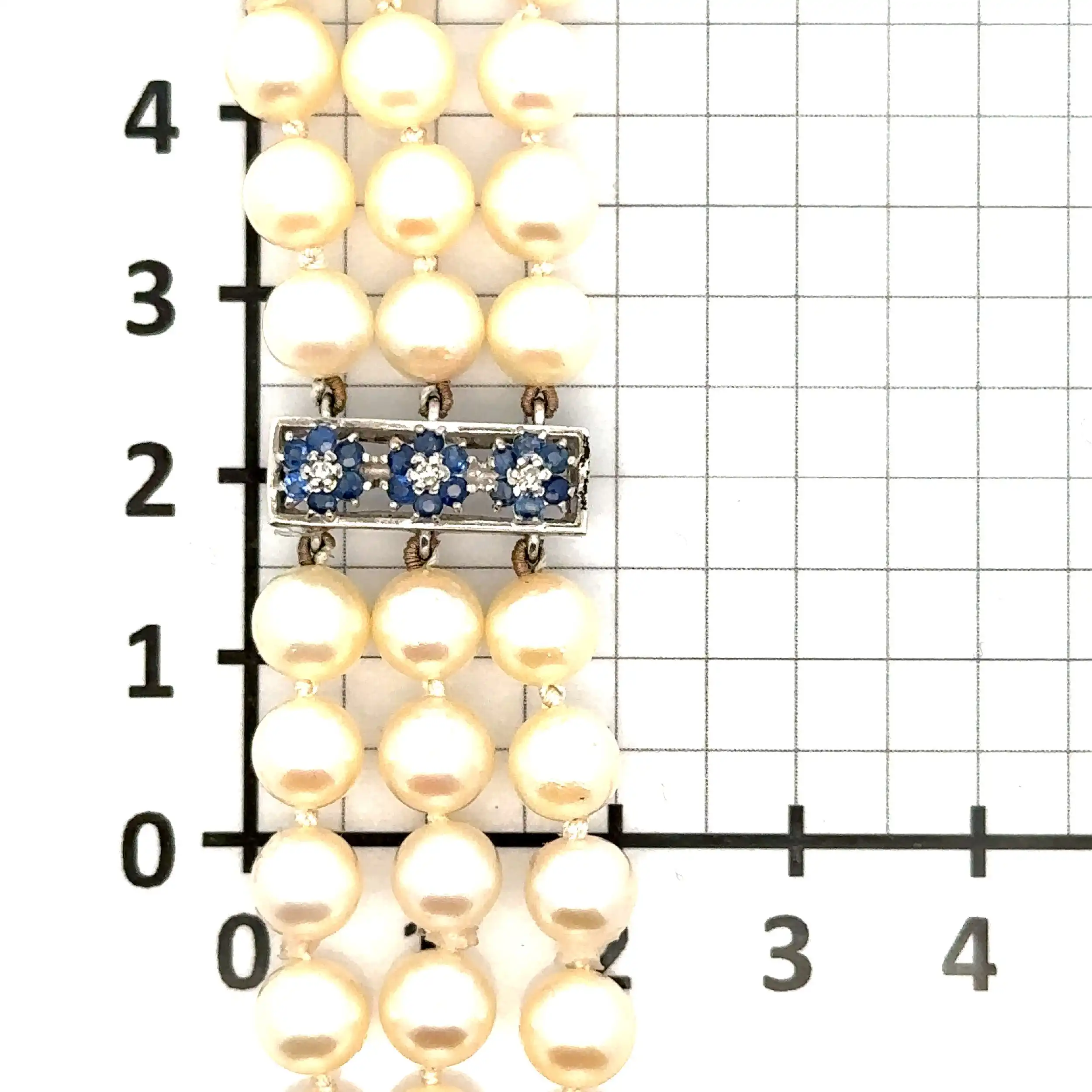 Perlarmband Weißgold mit blauen Steinen und Diamanten Perlarmband Weißgold mit blauen Steinen und Diamanten
