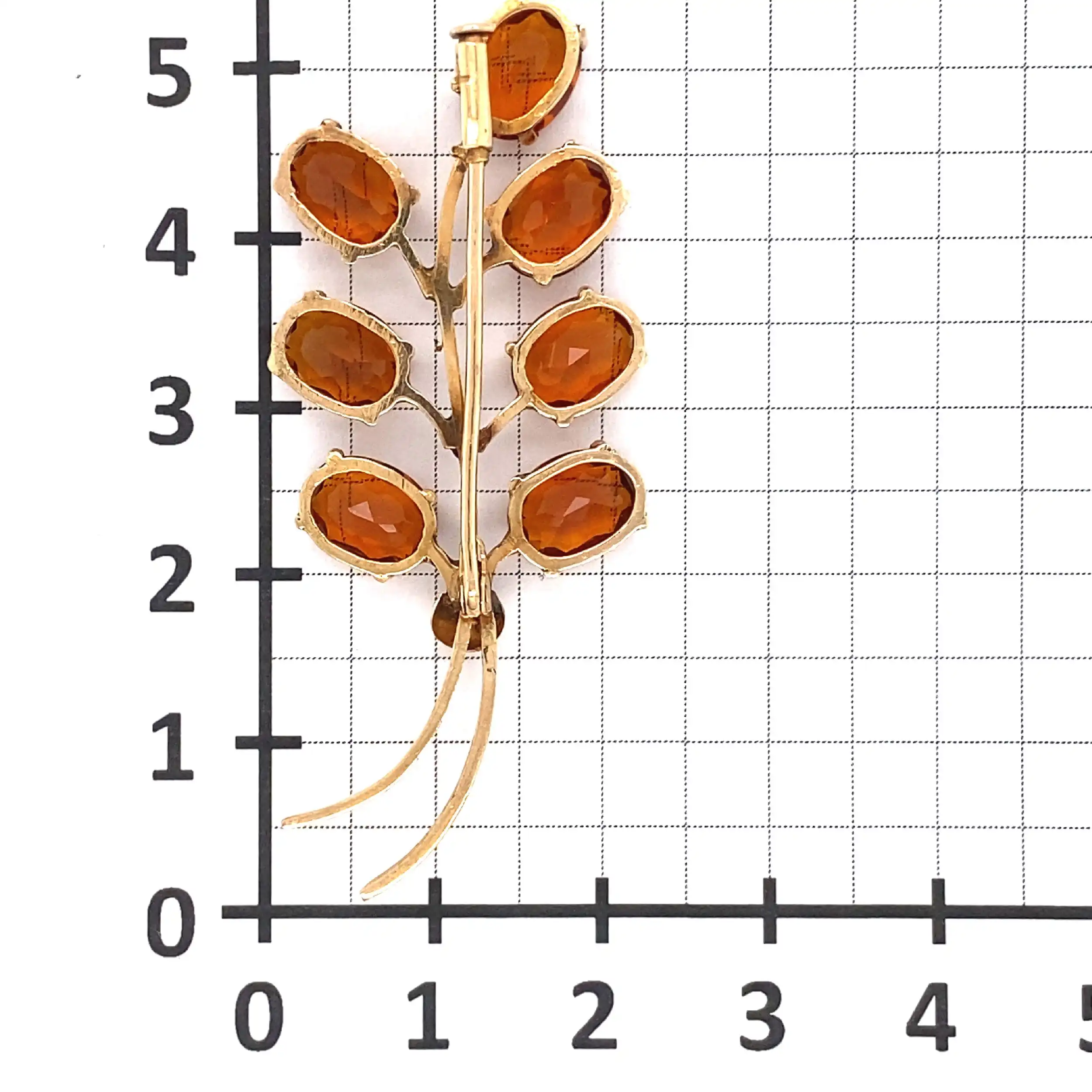 Brosche mit orangenen Farbsteinen Brosche mit orangenen Farbsteinen